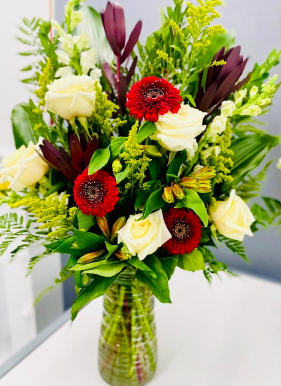 Panther Pride - Maroon and White mix of flower this is gorgeous bouquet.  Perfect mixture and perfect for any occasion.  (Premium shown in picture) 