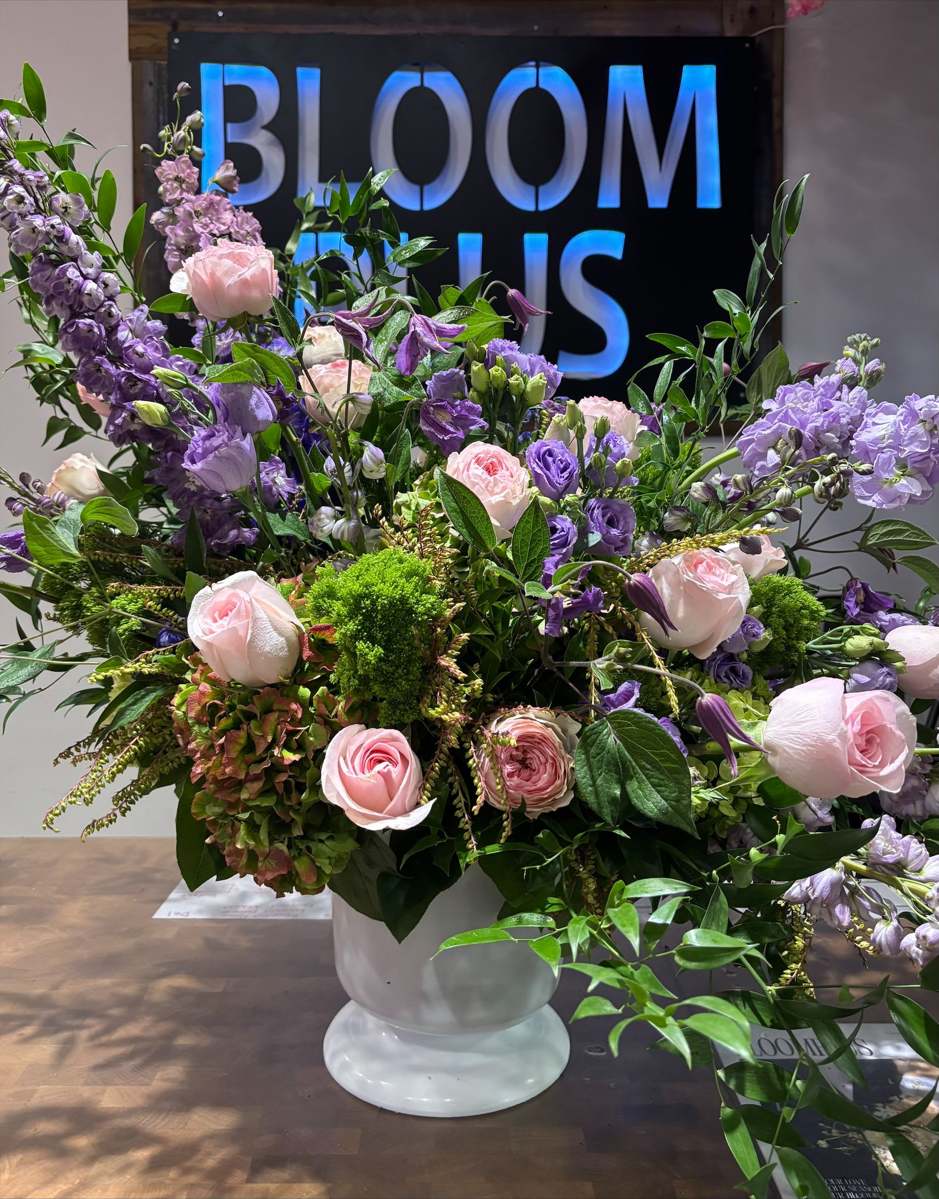 Forever in Bloom - An elegant mix of soft roses and seasonal flowers that radiates calm beauty. A versatile choice to brighten any space or occasion.