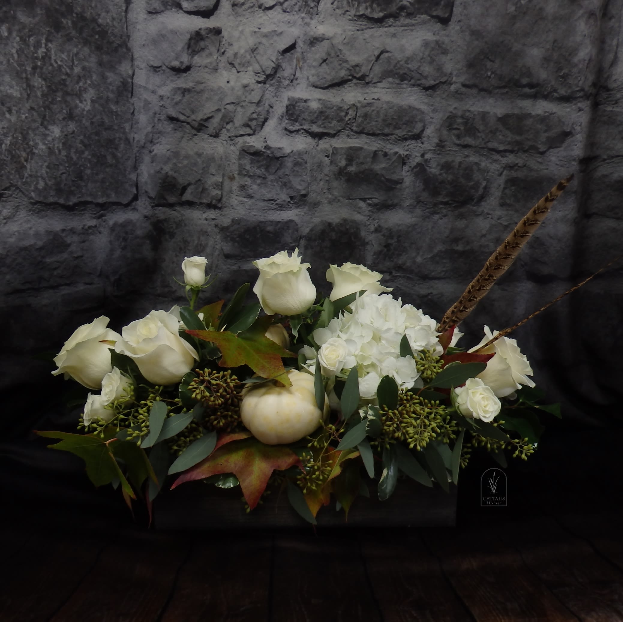Rustic Elegance - &quot;Rustic Elegance&quot; is a stunning Long and Low Elegant centerpiece in a rustic wooden box, perfect for that Autumn dinner table arrangement in Danville, CA, featuring creamy white roses and hydrangeas accented with autumn foliage, seeded eucalyptus, petite white pumpkins, and natural pheasant feathers for a refined seasonal touch.  