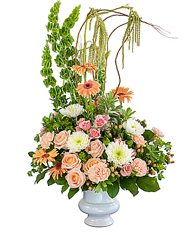 Divine Grace Tribute - The Divine Grace Tribute will stand out as a stylish arrangement at the final services of your loved one. Roses, Chrysanthemums, Bells of Ireland, Carnations, Gerbera Daisies and Hypericum Berries are displayed in a modern design. 