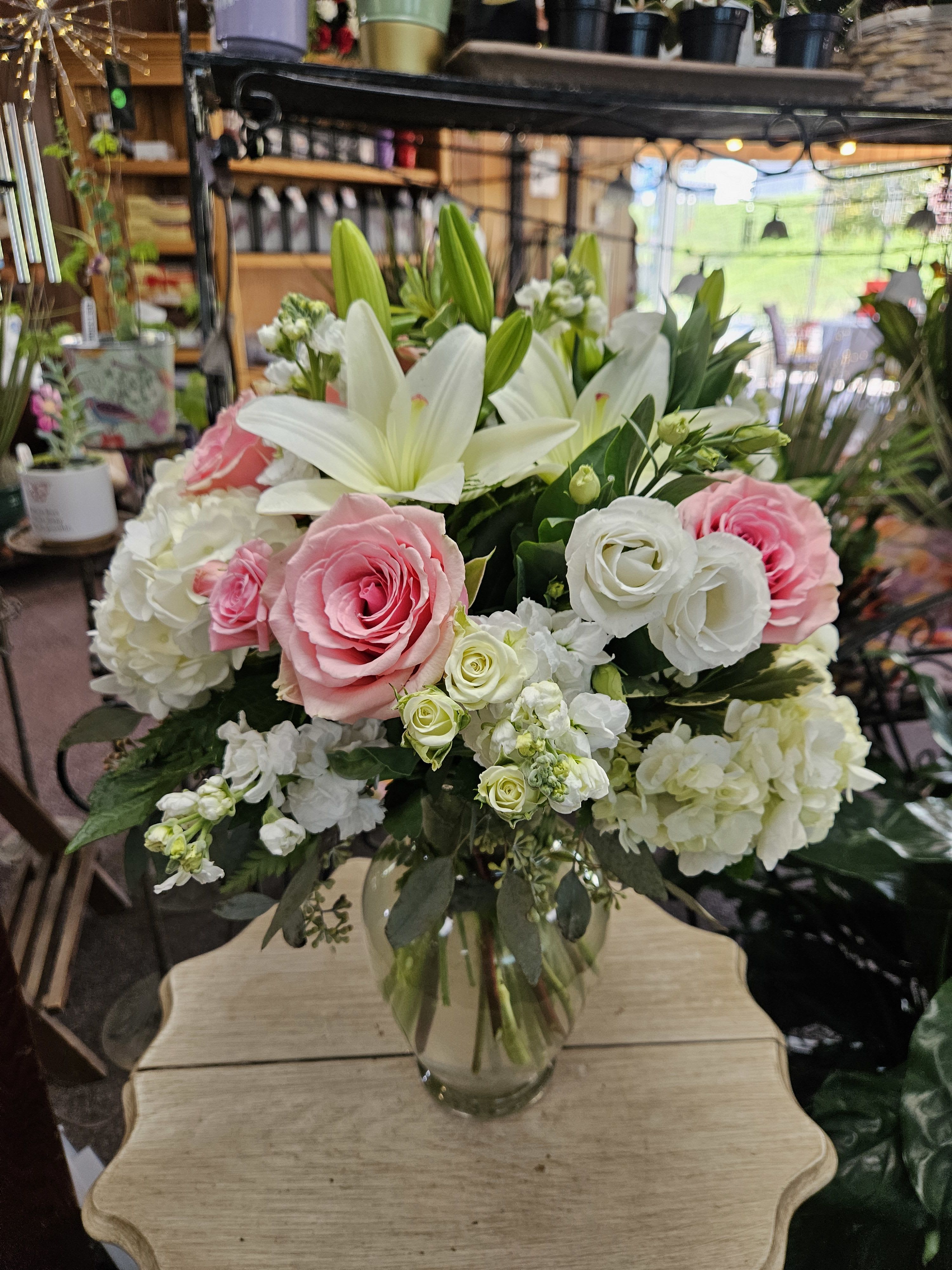 Beautiful Whisper - A whisper-quiet affirmation of love. Subtle shadings of pink and white roses and lilies 