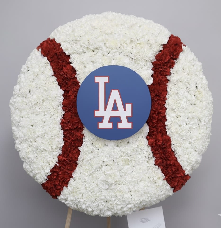 Ball Wreath  - This full wreath contains custom flowers . The standard size is approximately 30 inches wide, deluxe is approximately 36 inches wide, and premium is approximately 42 inches wide. Contact us to determine what type of ball you would like.     We include easel, printed banner, and delivery (some fees may apply). An additional banner can be added for $15