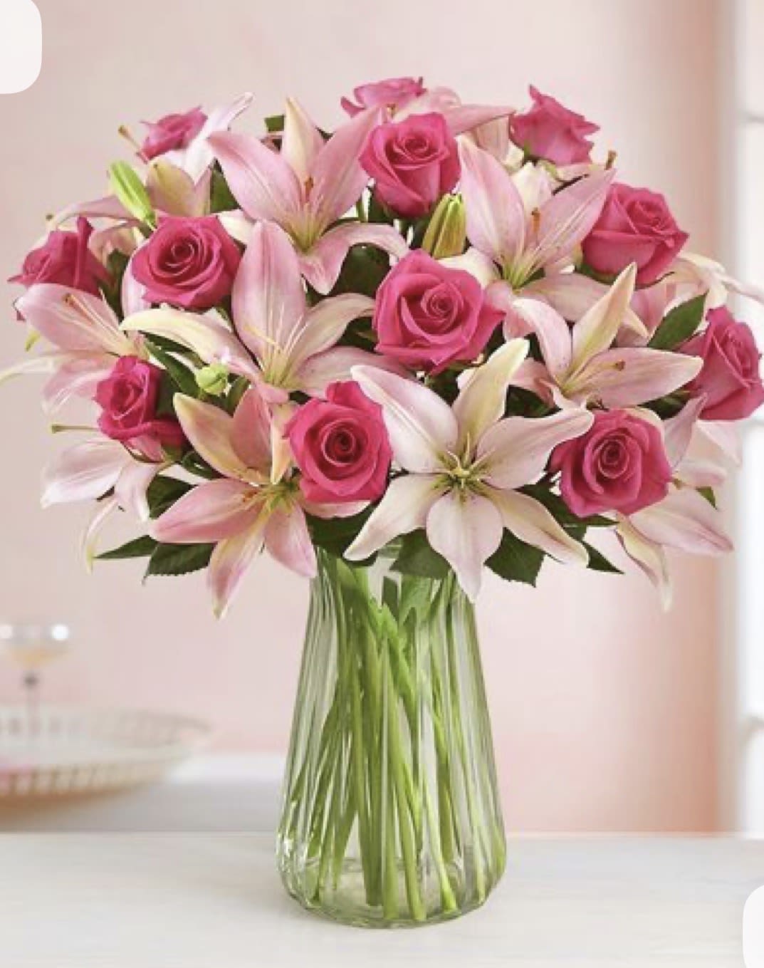 Magnificent pink rose &amp; Lily Bouquet - Magnificent is the only way to describe our all-pink bouquet. We've gathered one dozen long-stem roses with six, multi-bloomed Asiatic lilies for a gift that's sure to make an impression.