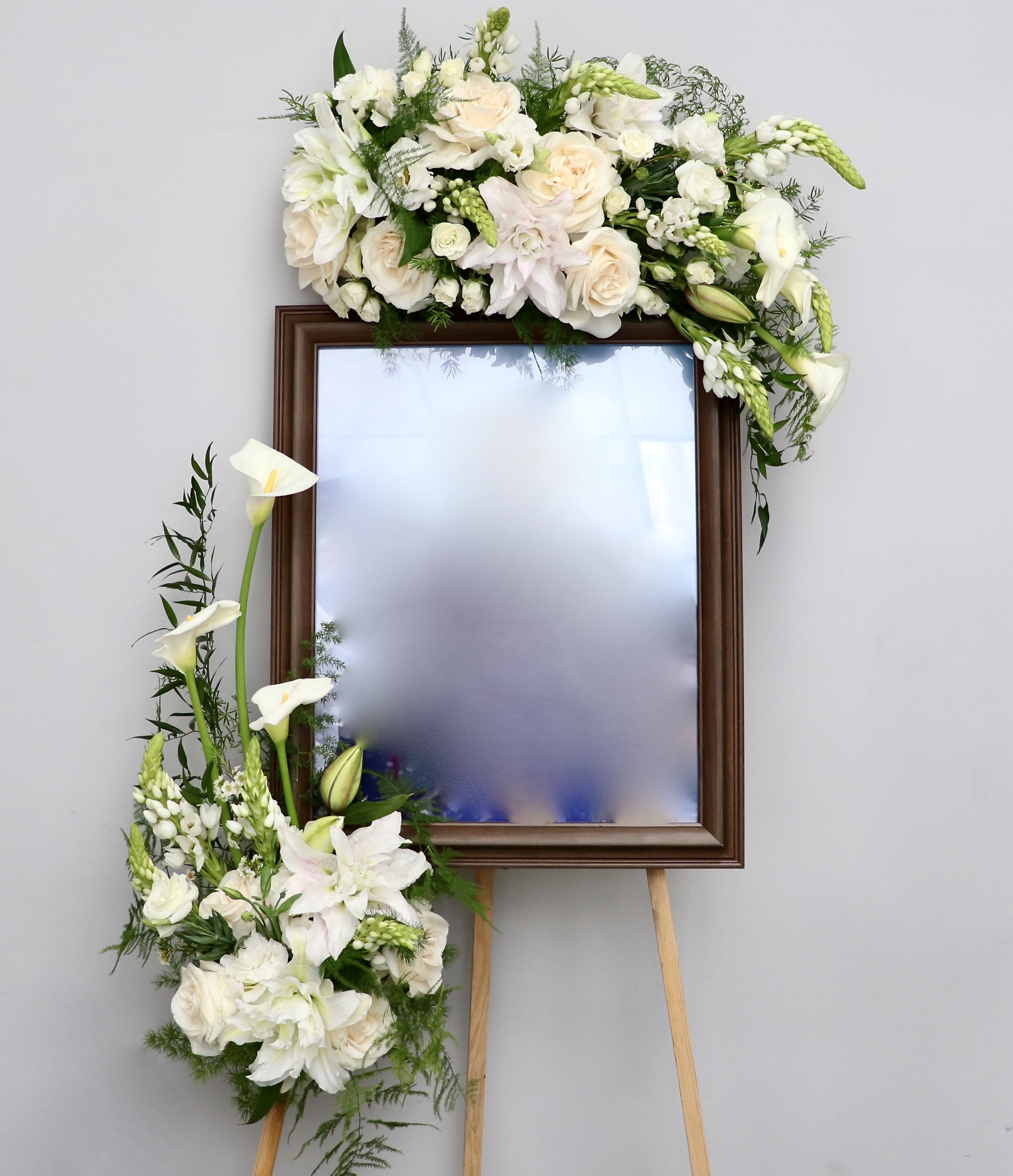 Forever Frame  - Frame is not included. We require one that's 16''x20''. Flowers will be attached to the top and bottom of included easel. Colors can be requested to be adjusted.     We include easel, printed banner, and delivery (some fees may apply). An additional banner can be added for $15