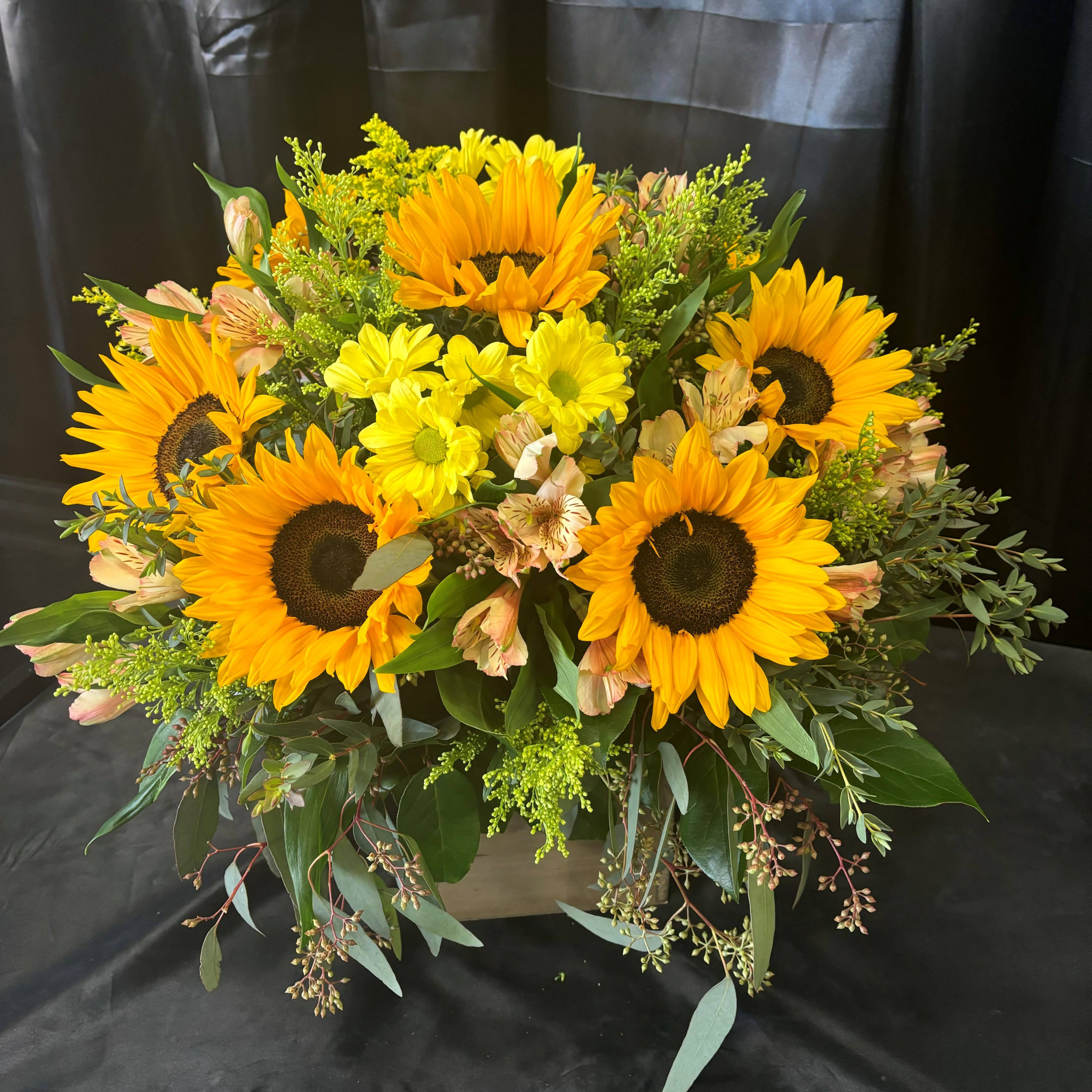 Country Fields - Beautiful combination of Sunflowers with mixed filler flowers and greens in a wooden box container. 