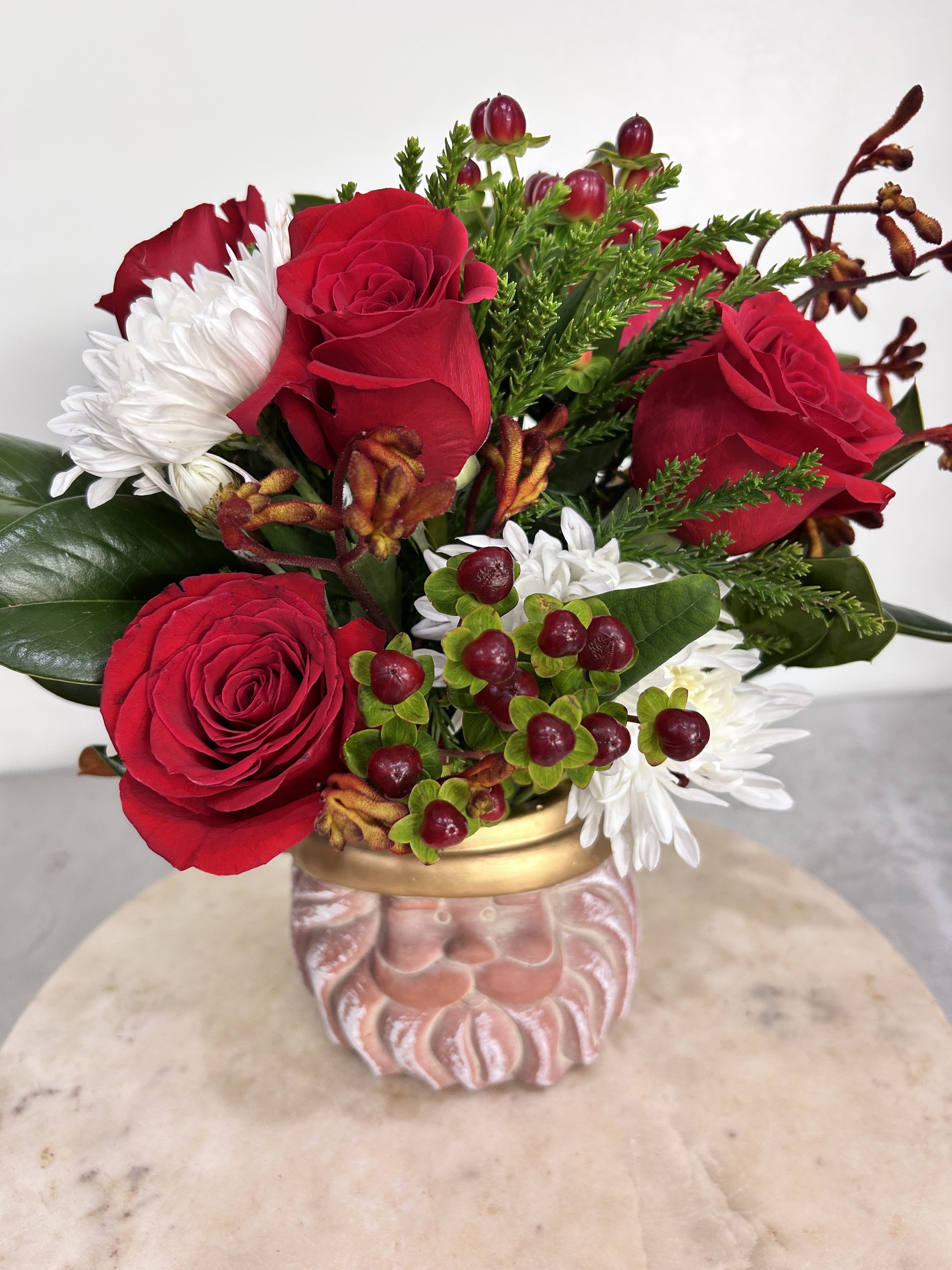 Santa Vase - A cute Santa vase for the holidays. Filled with seasonal fresh flowers. 