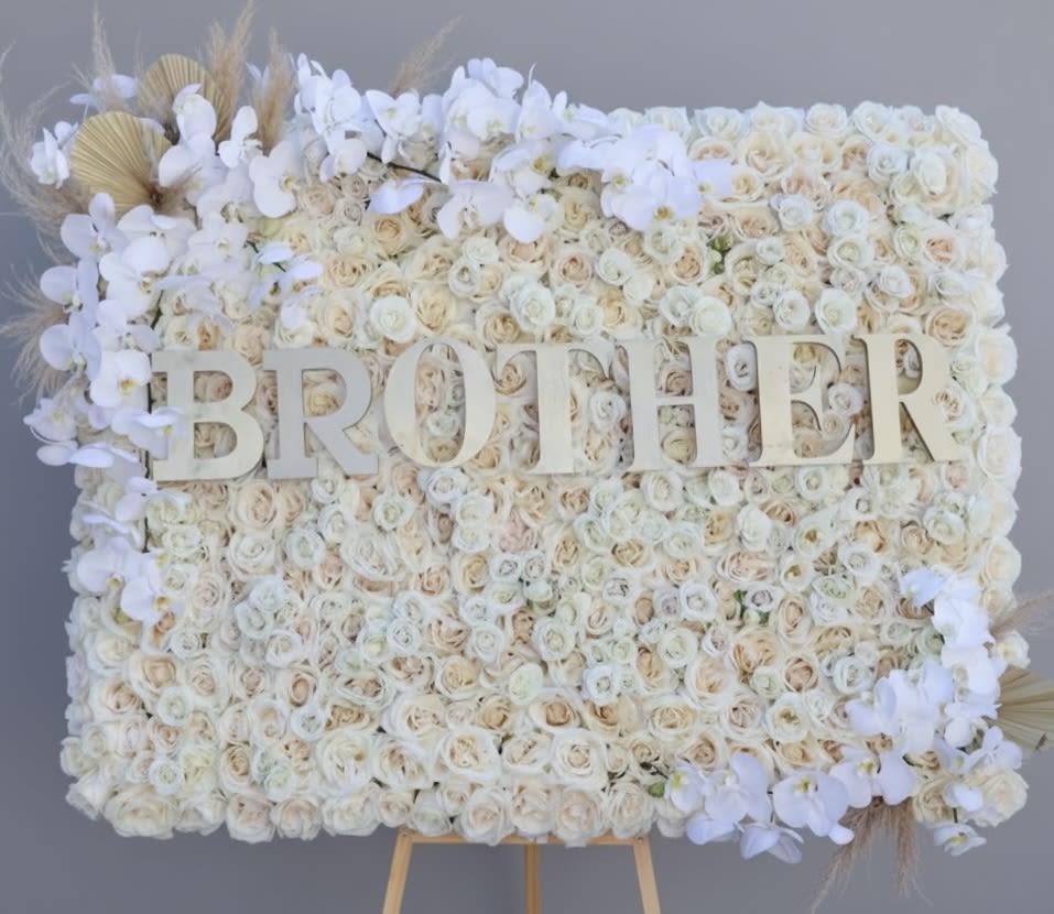 Rose Board  - This frame is covered in roses and accented with orchids and other florals along with a loved one's name or custom lettering.     Standard: 2'x3'  Deluxe: 3'x3'  Premium: 4'x3'