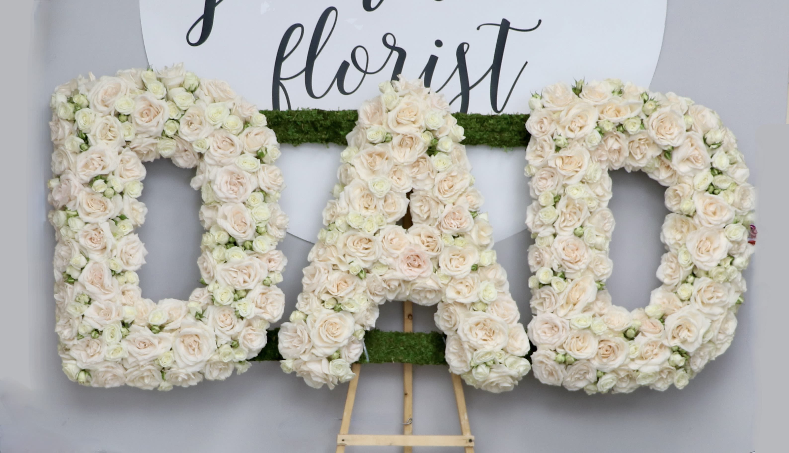 Dad or Mom Remembrance  - This sympathy Letters made out to DAD or MOM.  There are 3 sizes available: 24 inch in height, 30'' and 36''. All are on an easel. These would be the upgrades. You can indicate at checkout in the florist instructions what colors you would like them made in. 
