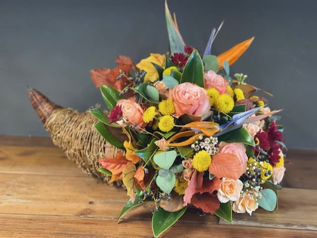 Bountiful Harvest - An extra large cornucopia with interesting, seasonal flowers.