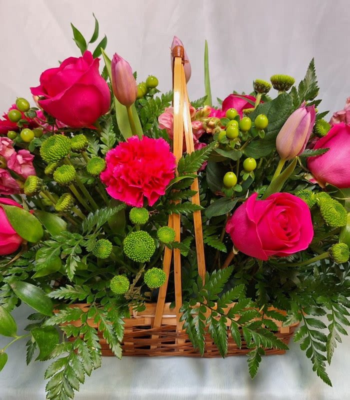 Lush Landscape - Handle Basket of lush greens, berries, lilies and roses.