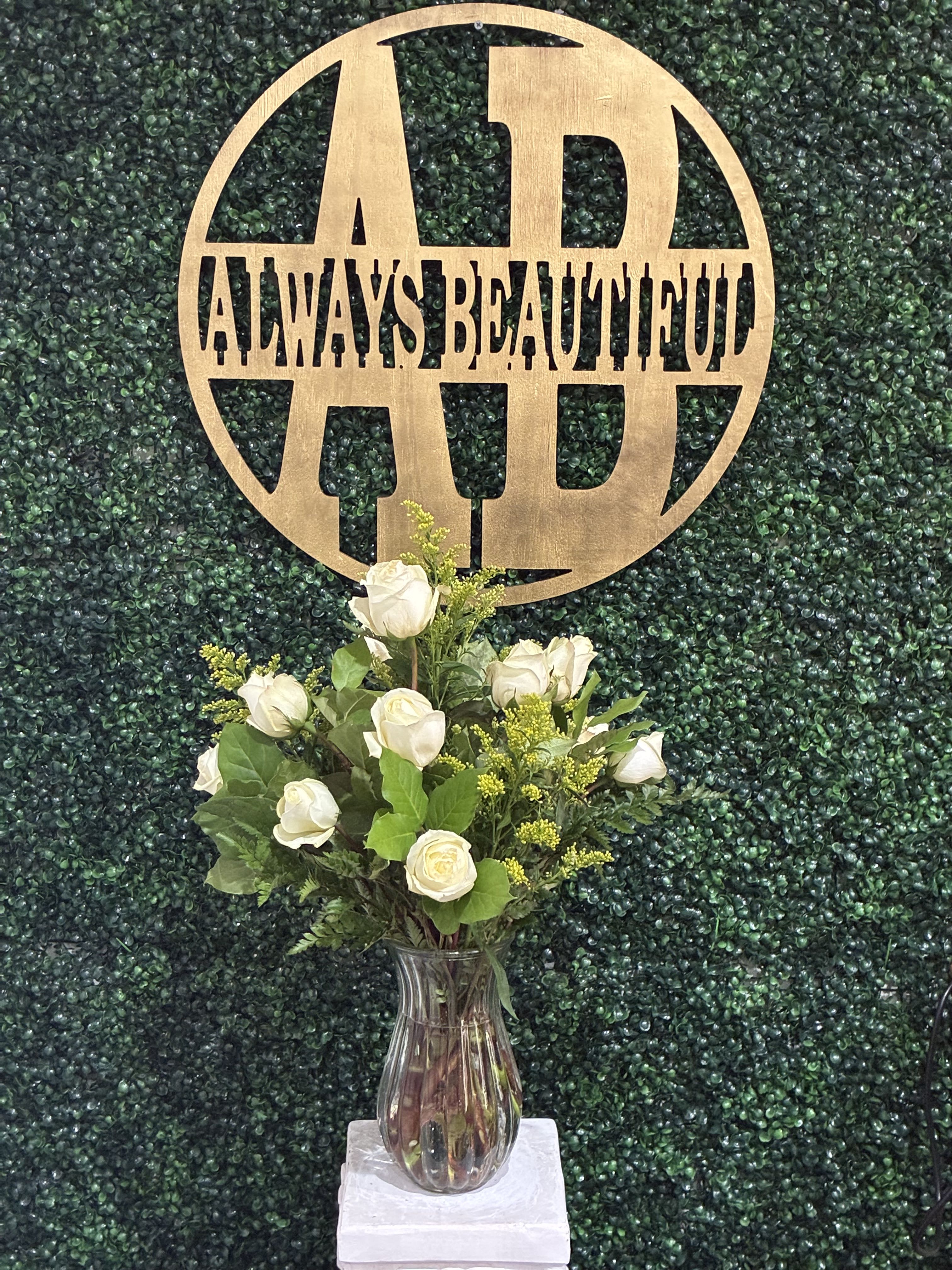 Dozen Long Stem White Roses - A dozen white roses are a classic gift! Perfect for Valentine's Day, an Anniversary, or any type of celebration.  Approximate Dimensions: 20"D x 30"H