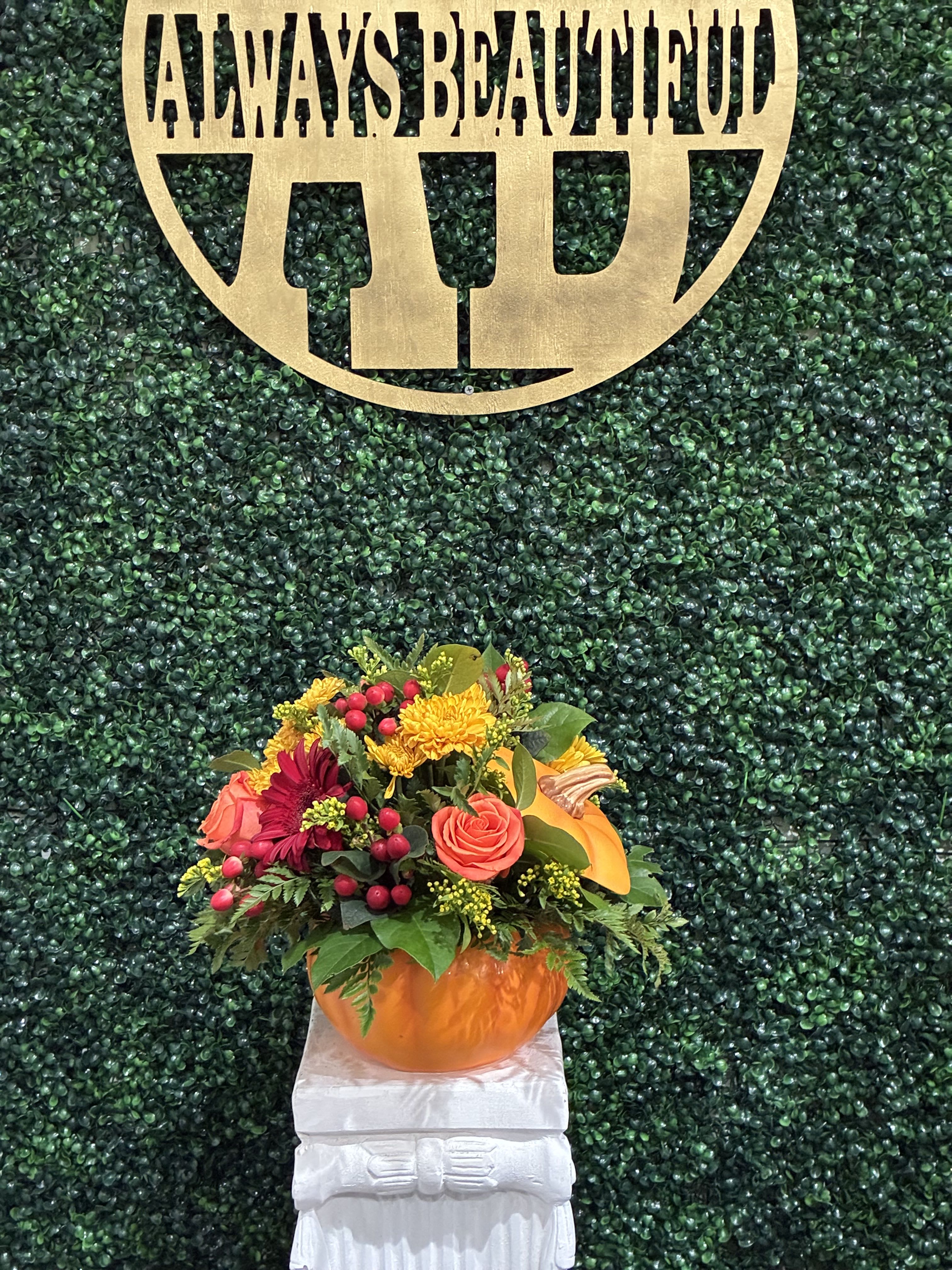 Pumpkin Spice &amp; Everything Nice - Celebrate the cozy spirit of autumn with our Pumpkin Spice &amp; Everything Nice arrangement! Bursting with warm seasonal blooms and rustic fall accents, this handcrafted design is nestled in a festive Jack-o’-lantern vessel that’s as charming as it is reusable.  Perfect as a centerpiece, a seasonal décor accent, or a thoughtful gift, this arrangement brings all the colors, textures, and comfort of fall into your home. From Halloween gatherings to Thanksgiving tables, it’s the sweetest way to say “hello, autumn!”