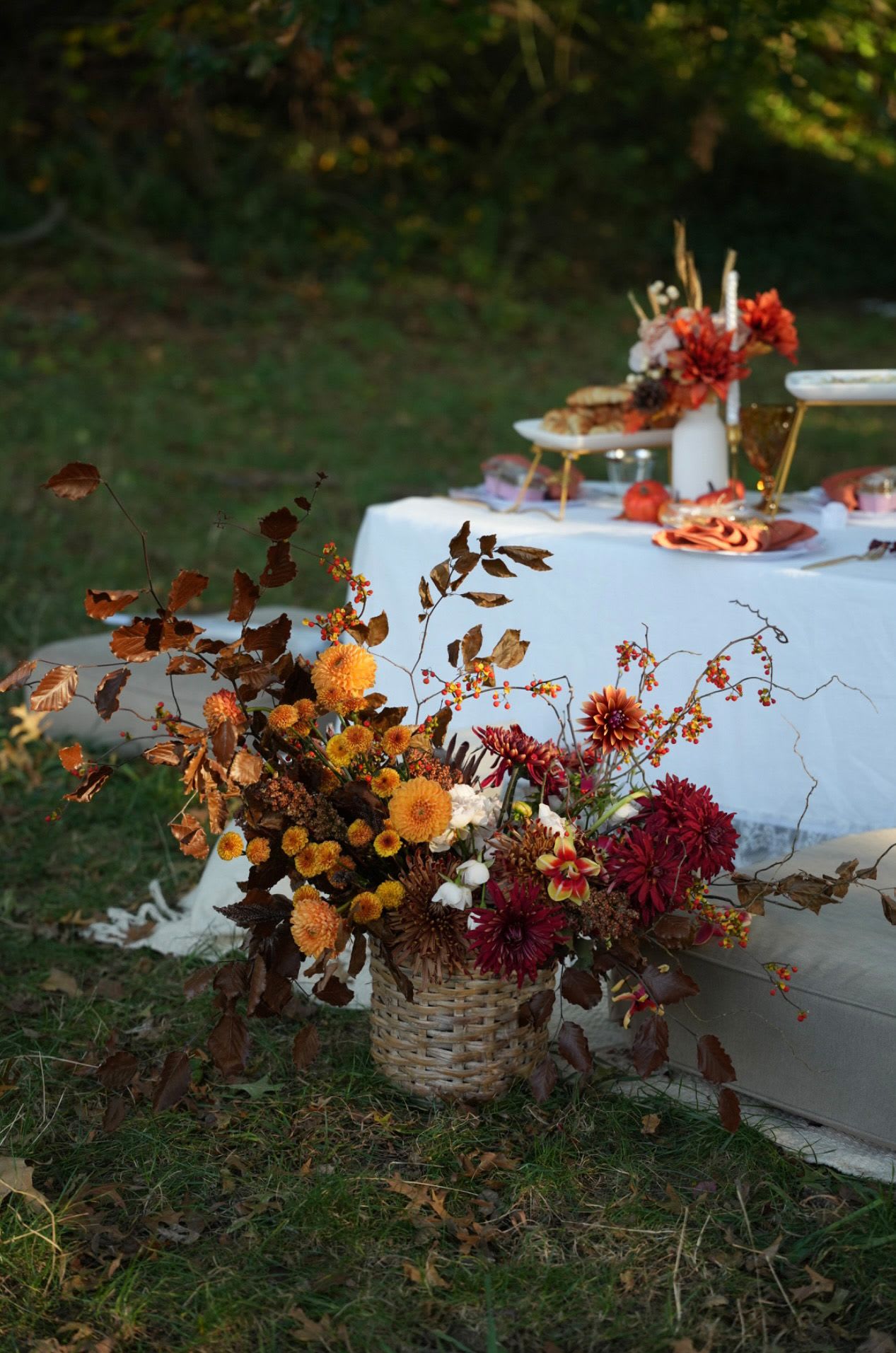 Rust Velvet - A beautiful fall-inspired basket arrangement featuring seasonal flowers in deep wine and amber tones — ideal for any autumn occasion.