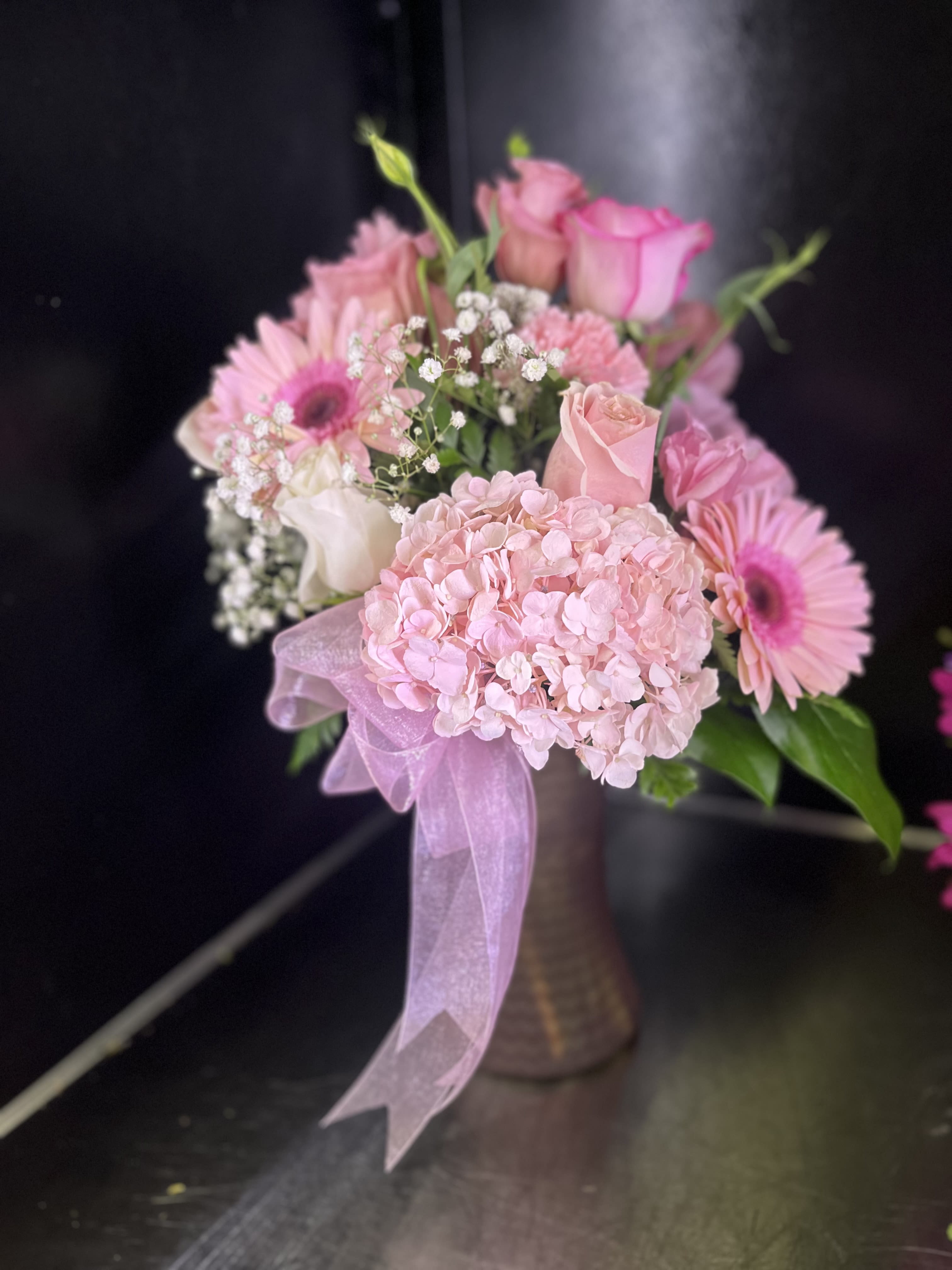 Pink  - fresh pink flowers in pink long vase 