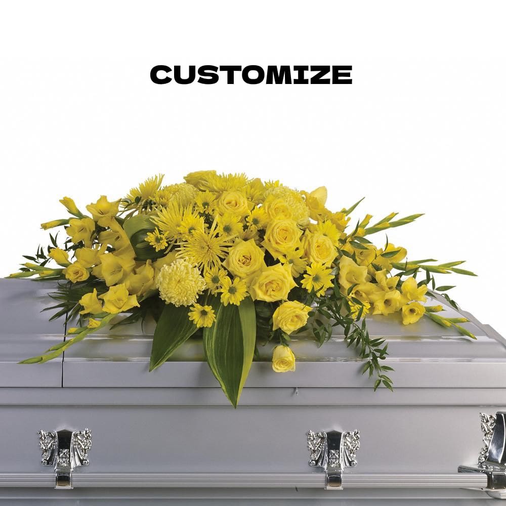 Custom Half-Casket Spray - Honor your loved one with a custom half-casket spray, thoughtfully designed to reflect their memory with beauty and elegance. This floral arrangement is placed on the casket, offering a heartfelt expression of love and remembrance.  Personalize your tribute by leaving a note at checkout with your preferences—select specific flowers, colors, or a meaningful theme to create a truly unique arrangement. Our skilled florists will carefully craft a stunning display that conveys your deepest sympathies.  Each spray is made with fresh, premium blooms, arranged with care to provide a graceful and comforting presence at the service.  Let us create a meaningful tribute that honors your loved one’s memory. Share your vision, and we will bring it to life with compassion and dedication.