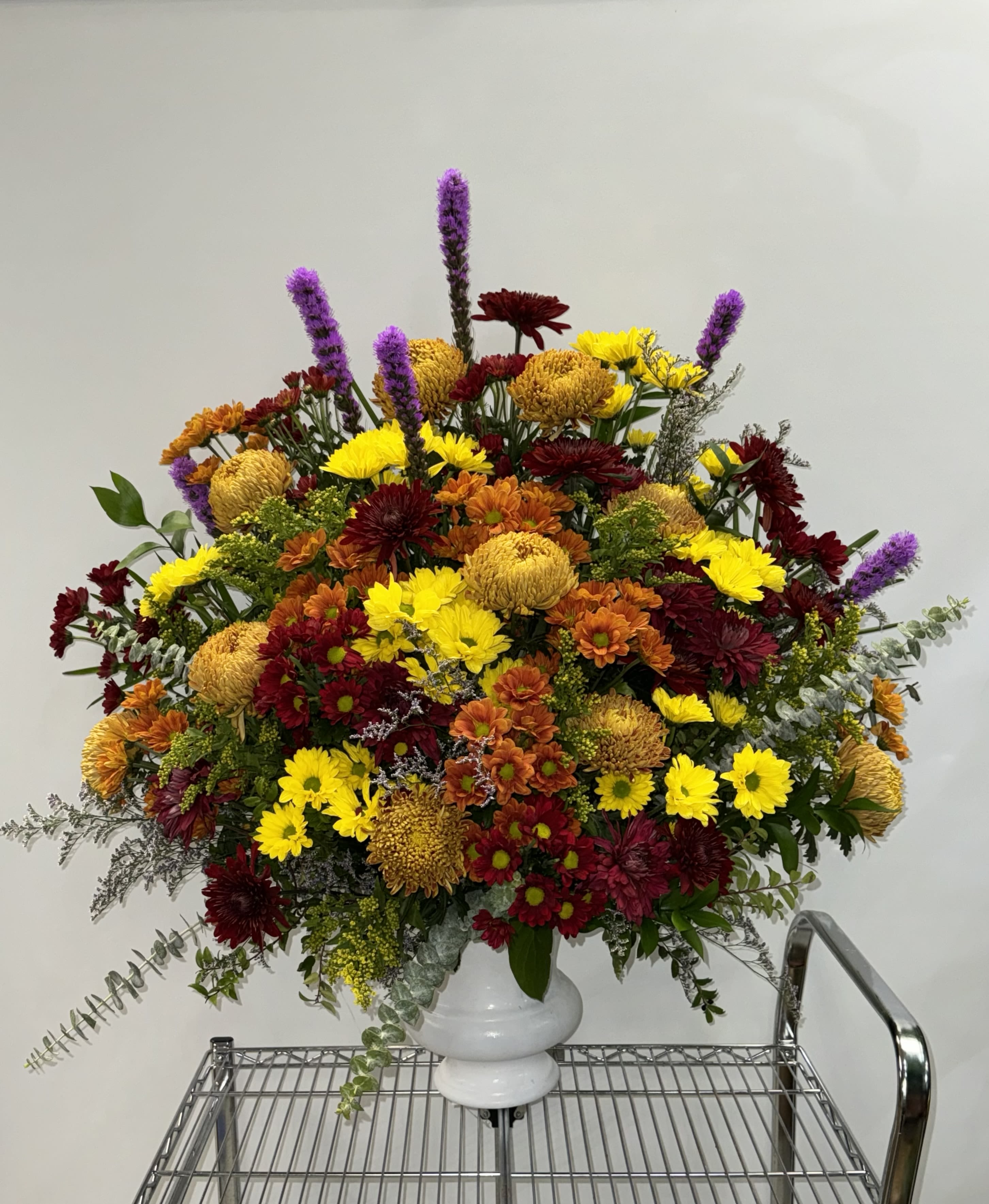 Floor  Angel Basket - Fall color sympathy basket for a wake, funeral, church service This color combo can be made as a spray, wreath, or casket as well. Call the store to speak about options