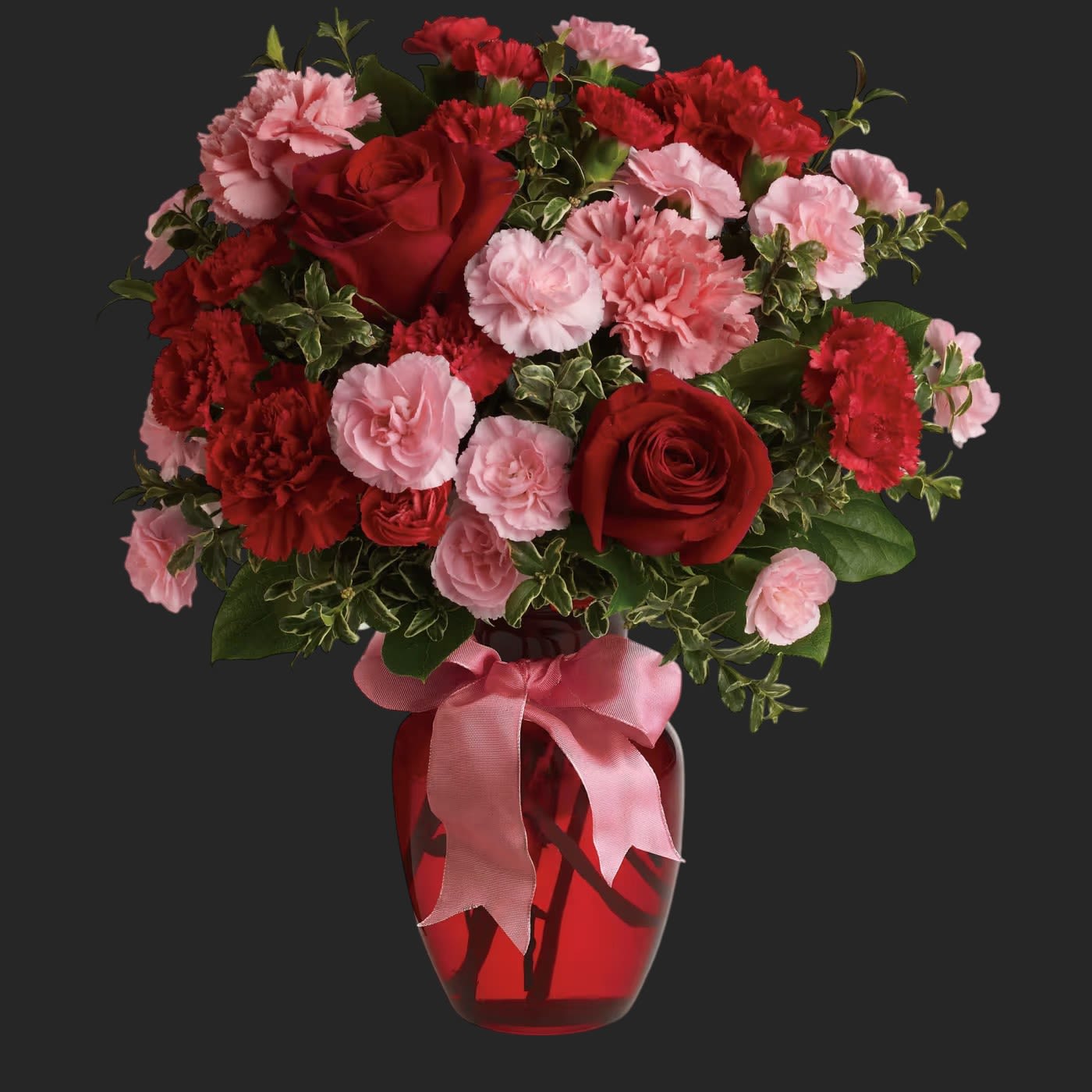 Dance with Me Bouquet by Teleflora - Turn up the heat on your relationship with this sizzling bouquet of carnations and roses in a sparkling glass vase. It makes a spectacular gift for anniversary or any loving occasion.  