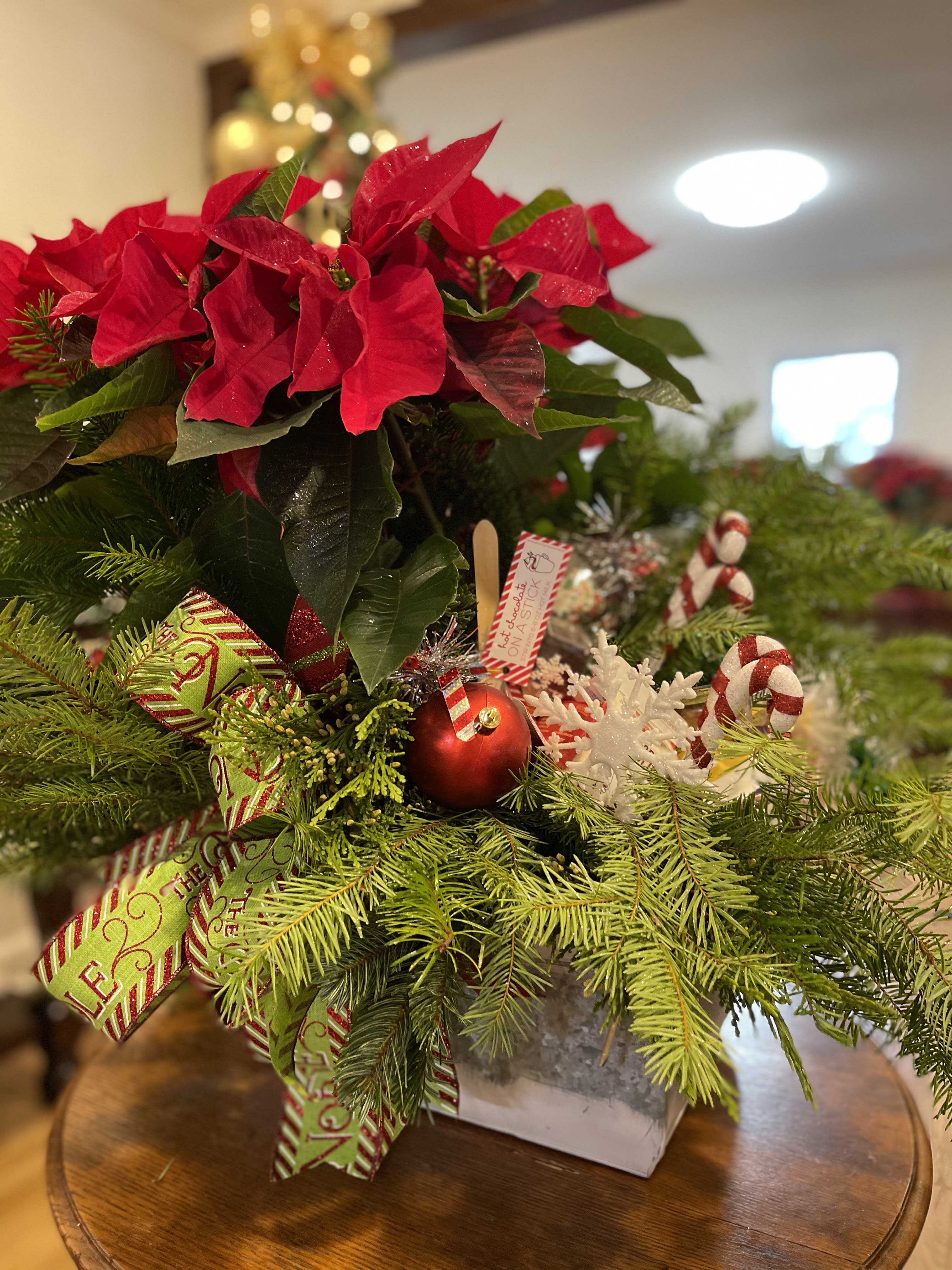 Custom Holiday Gift Basket - Treat everyone on your gift lift to a custom, uniquely designed gift of a seasonal plant or arrangement, specifically selected gifts such as candles, bath soaps, chocolates and so much more.  Let us take the worry and stress out of the holiday and deliver this gift directly to their door.