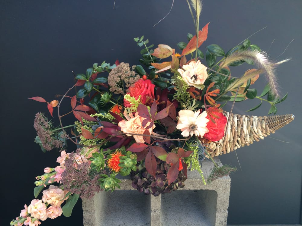 Thanksgiving Cornucopia  - A gorgeous modern–meets–rustic arrangement, perfect as a hostess gift — whether you’re celebrating Thanksgiving or simply the beauty of autumn. Each order includes a wicker cornucopia vessel that can be enjoyed and reused for years to come.