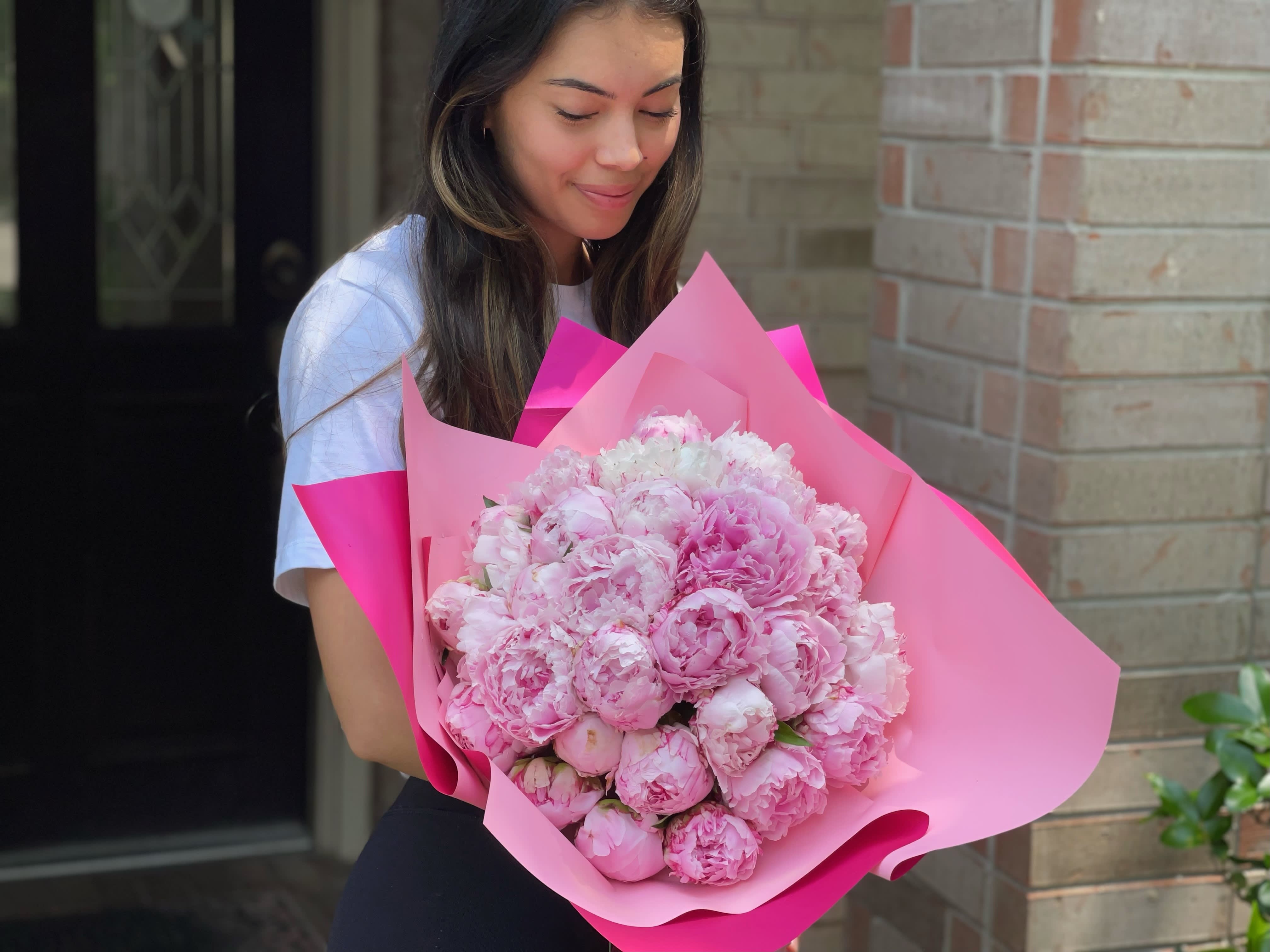 Peonies Bouquet - 15  peonies in a wrapped bouquet. Please note: The availability most be confirmed prior to order . Subject to availability. The colors may changed.