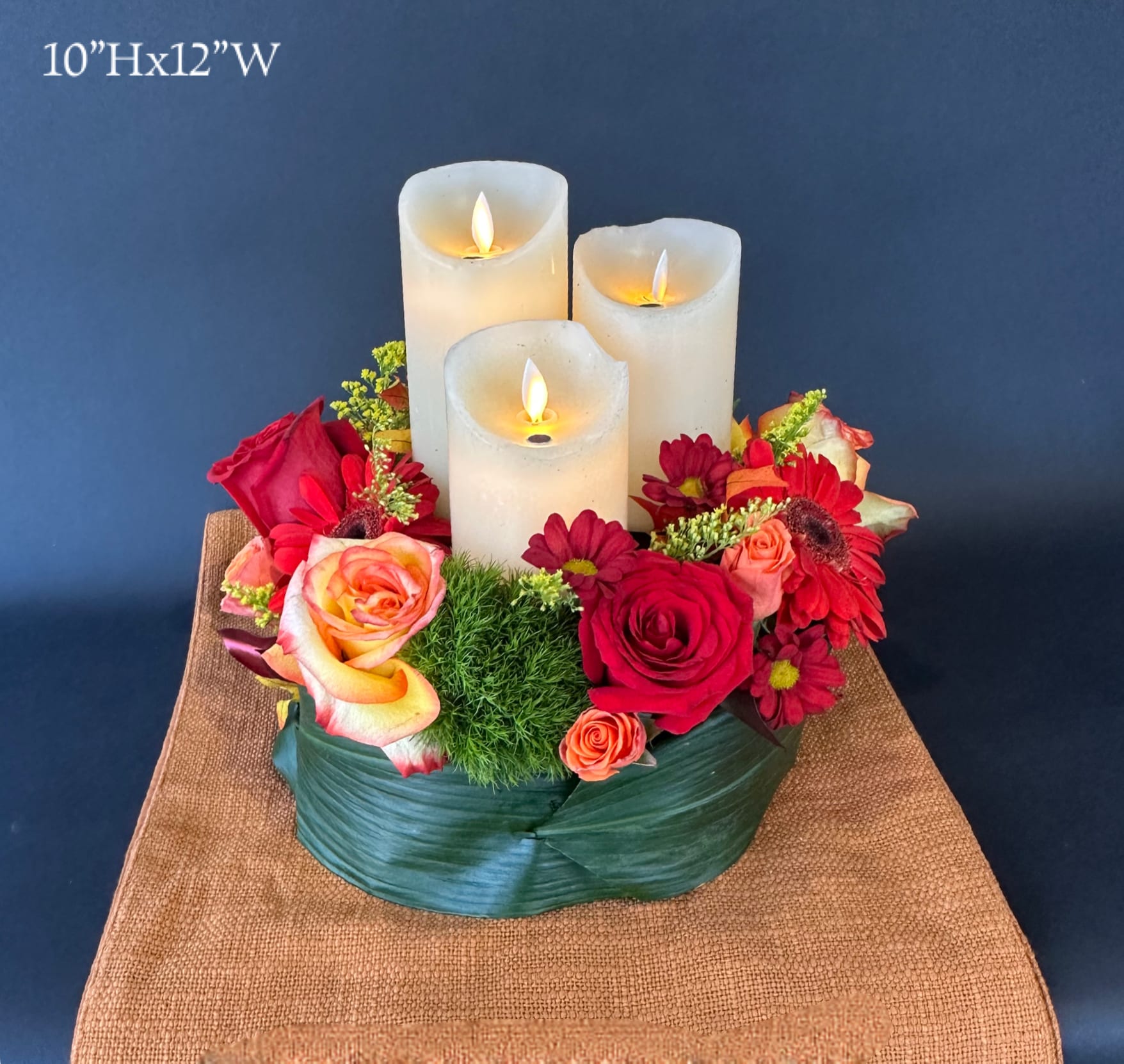 Autumn's Flame - This design will make you feel like you're walking through a quaint field of  &quot;Autumn's Flame&quot; . It would be the perfect centerpiece for the home or a hostess gift for Thanksgiving dinner.  Candles are battery operated 