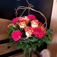 HEATHER/WOODS - A MIX OF CARNATIONS AND  ROSES WRAPPED IN CURLY WILLOW