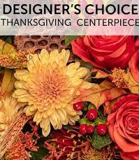 Thanksgiving Designer's Choice - Our Designer will create a one of a kind arrangement using only the best flowers in season!