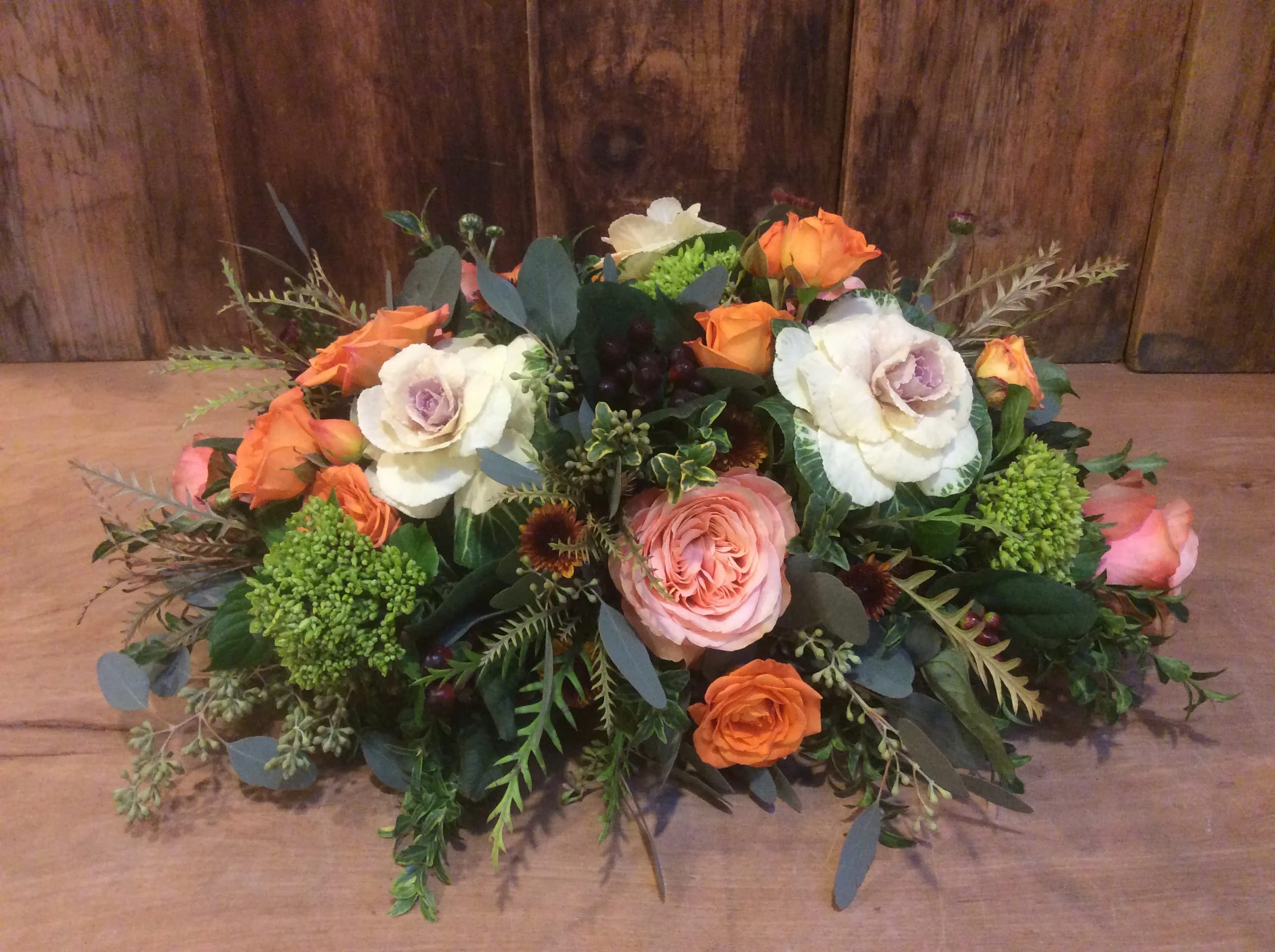 Soft Autumn Oblong centerpiece  - Elegant and abundant simply describes this beautiful table piece.   Softer , warm floral colors will be selected to create this elegant table scape .   Appox. 22&quot;long   Flower selection  will vary 