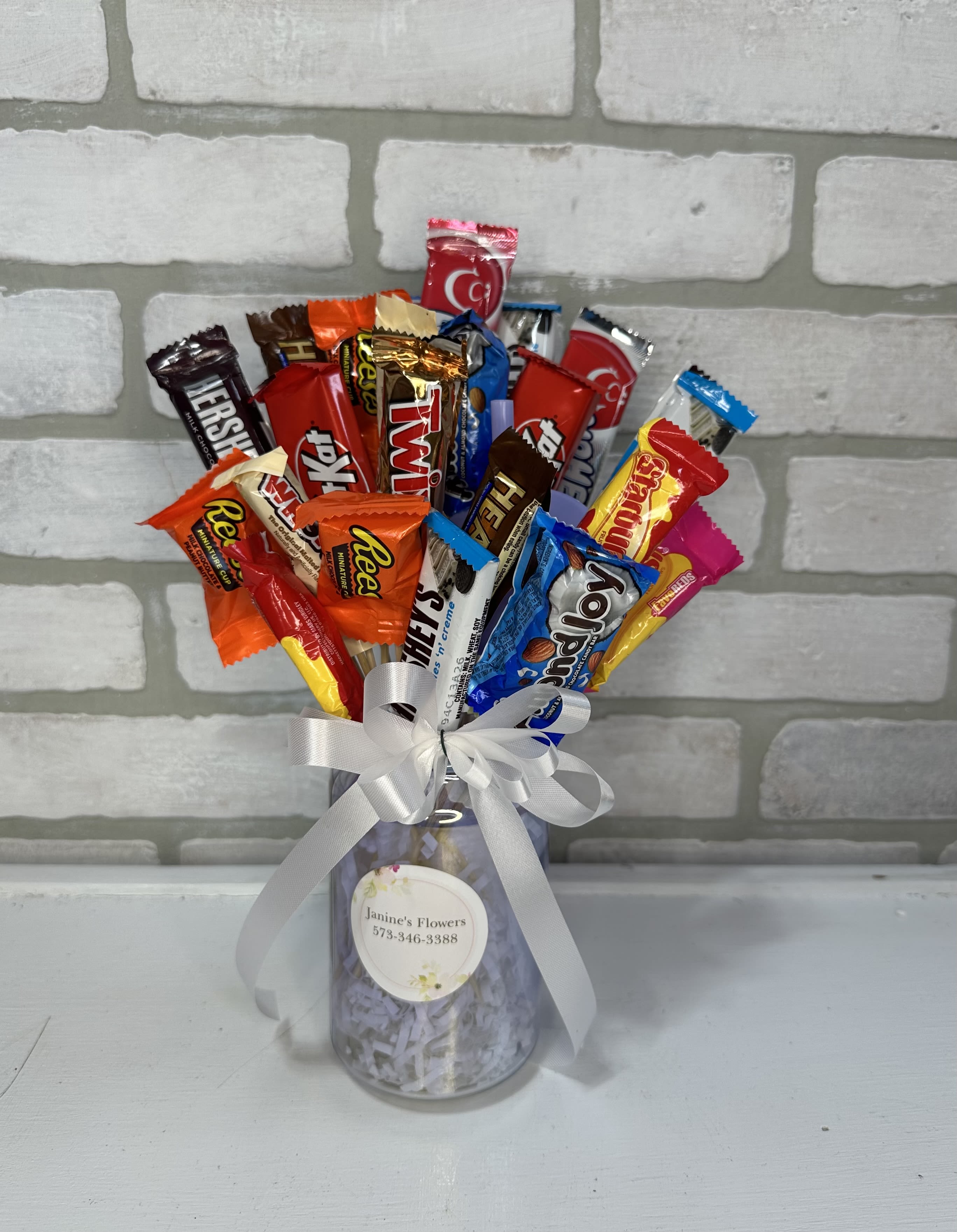 Candy Cup  - An assortment of candy filled in a souvenir Janine's cup 