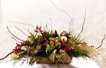 Evergreen Design - An all green centrepiece made with fir, pine, cedar, rustic branches, bows, berries and more.