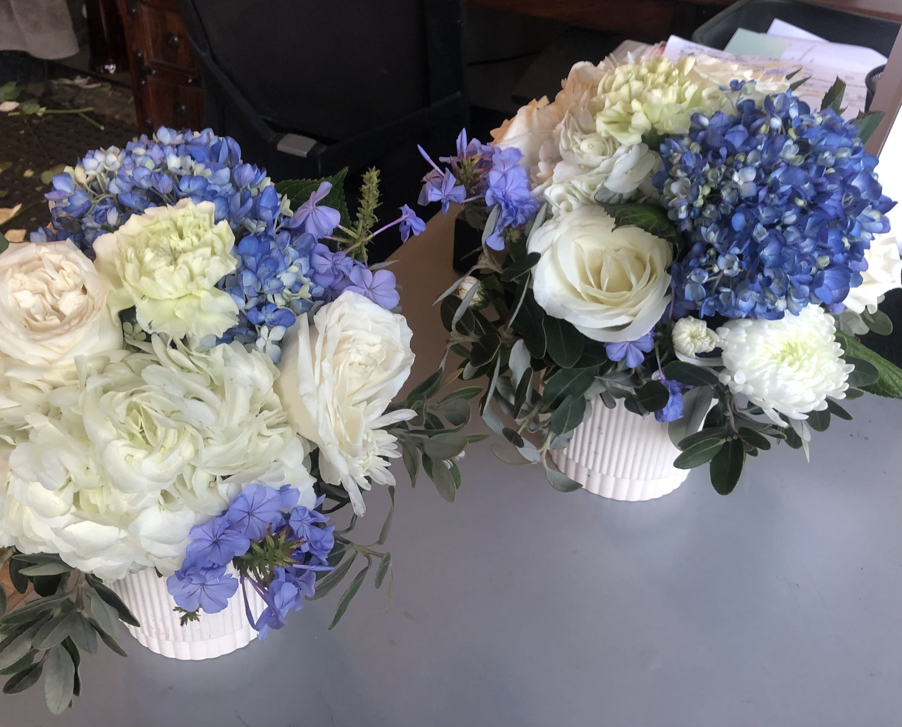 2 piece set blue and white centerpieces - Beautiful centerpiece- This arrangement shows off  blue and white blooms , featuring roses and hydrangea. Great table piece for any celebration.  