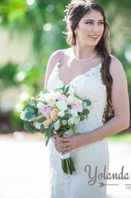 Taylor Wedding Bouquet - The Taylor Wedding Bouquet by DGM Flowers | Fort Lauderdale Florist is a stunning floral arrangement perfect for any bride. Elevate your special day with the Taylor Wedding Bouquet. This luxurious bridal bouquet features a stunning combination of ivory rose, white ranunculus, white tulips, light pink rose, and other white flowers. Radiant and sophisticated, it is the perfect statement of everlasting love.