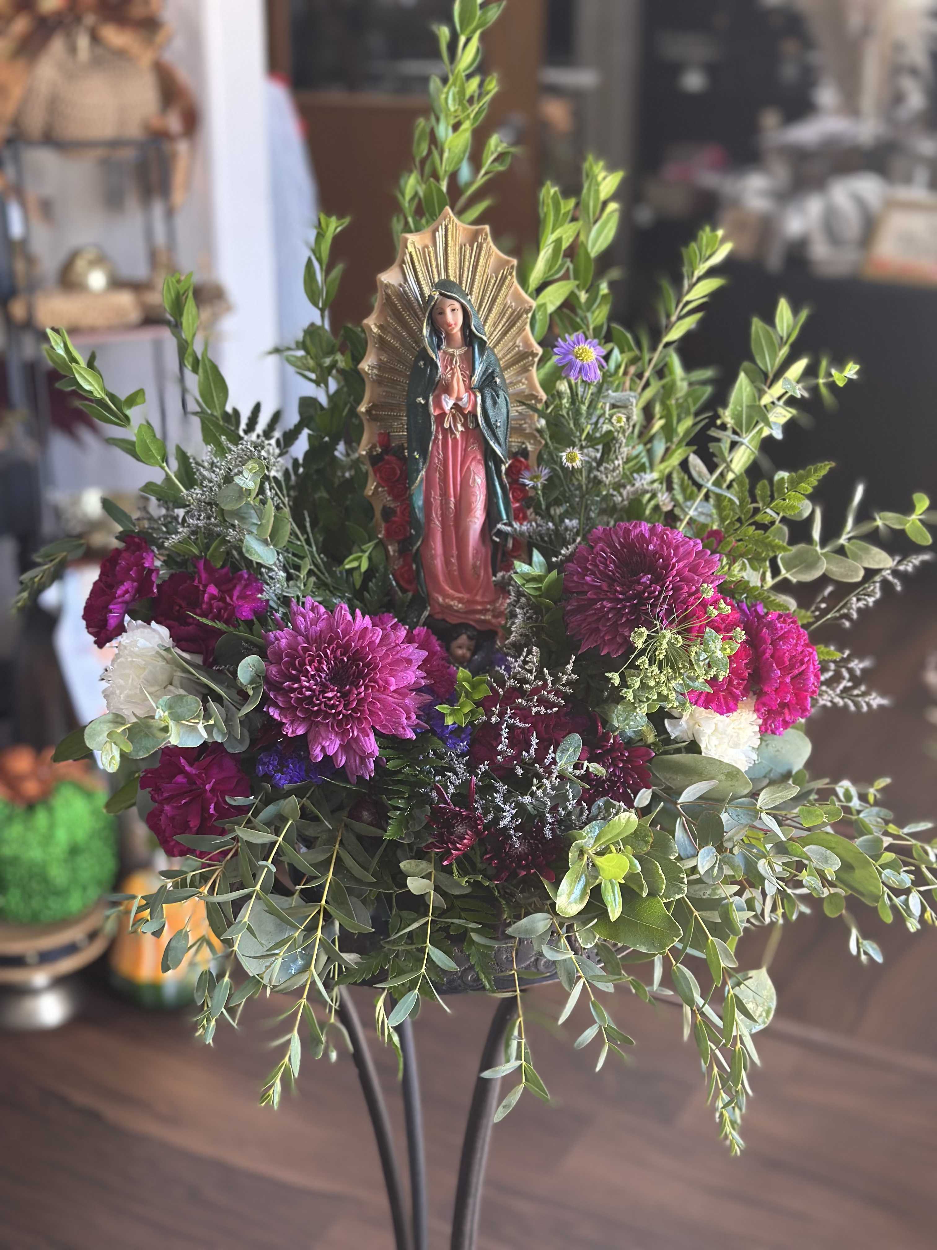Garden Harmony  - Floral arrangement with religious statue