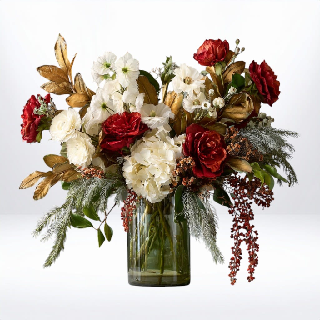 Gilded Holiday Cheer Bouquet - The Gilded Holiday Cheer Bouquet radiates sophistication with a festive twist. Featuring rich red roses, white hydrangea, and delicate white blooms accented by golden magnolia leaves and evergreen textures, this luxurious arrangement captures the essence of the holiday season. Designed in a tall glass vase, it brings warmth, cheer, and timeless elegance to any holiday gathering or winter celebration.  Available for same-day flower delivery in Galveston, Houston, and surrounding areas, this design makes a perfect gift or centerpiece for those who love refined holiday décor.  Substitution Disclaimer: Due to seasonal availability, some blooms may be replaced with similar varieties of equal or greater value to maintain the design’s look and integrity. Your arrangement will always reflect the same spirit, palette, and premium quality.