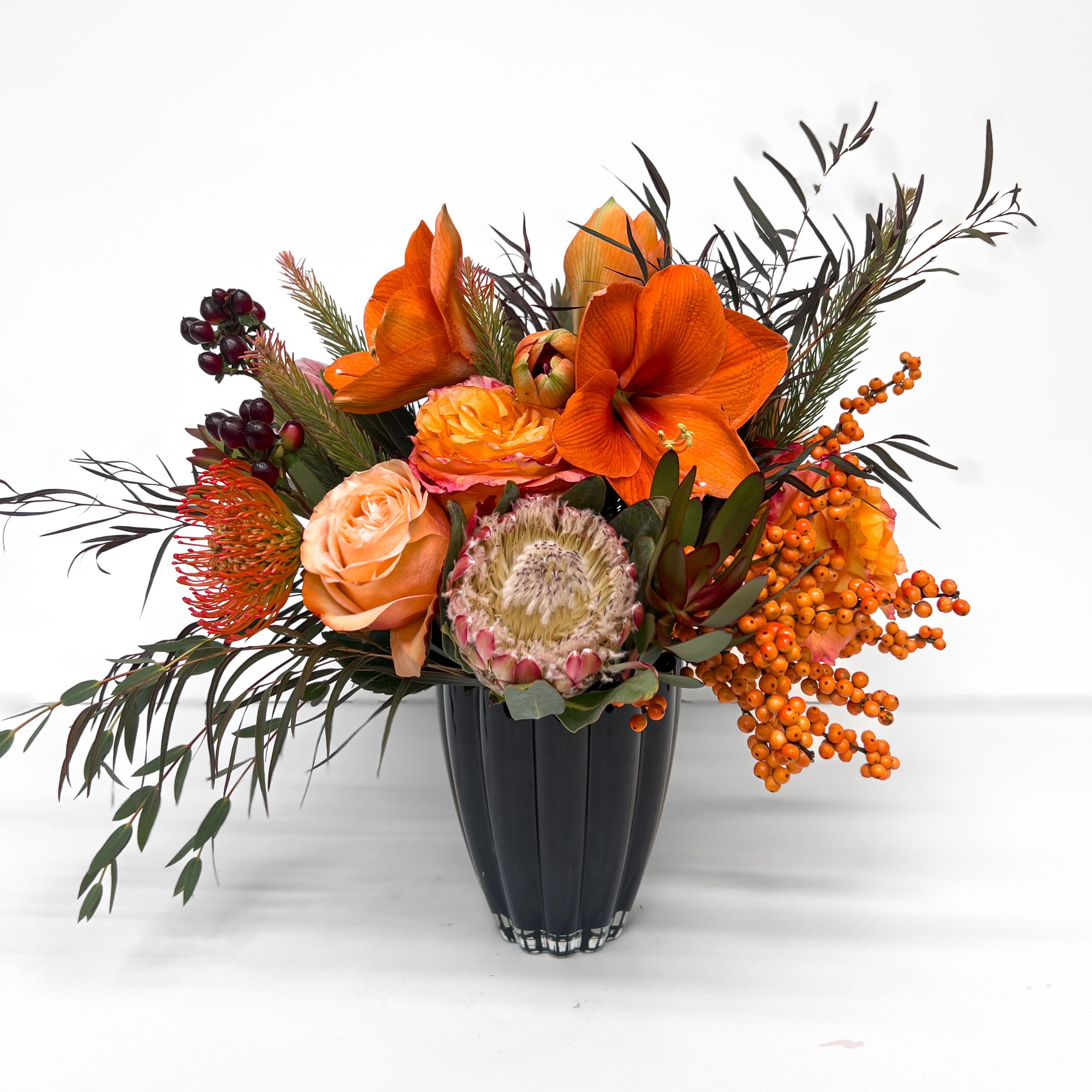 Ember  - Bold, moody, and utterly unique, Ember is designed to stand out on any Thanksgiving or autumn table.