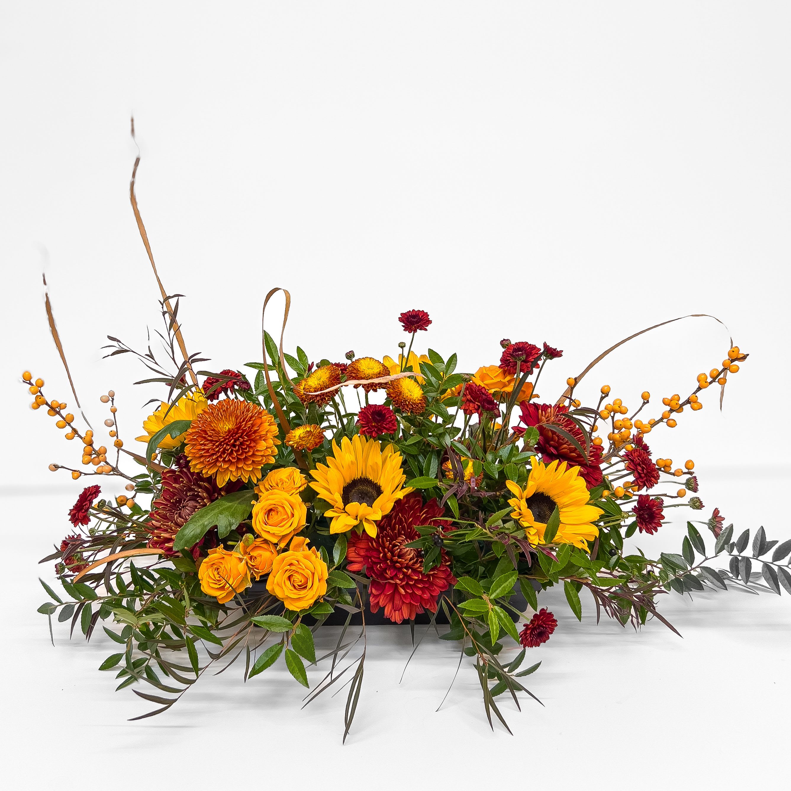 Meadow Harvest - Hand-curated by our designers, each arrangement captures the natural abundance and textured beauty of a late-season meadow. Perfectly scaled for Thanksgiving tables or seasonal gatherings, it brings warmth, layered textures, and effortless elegance to any setting.