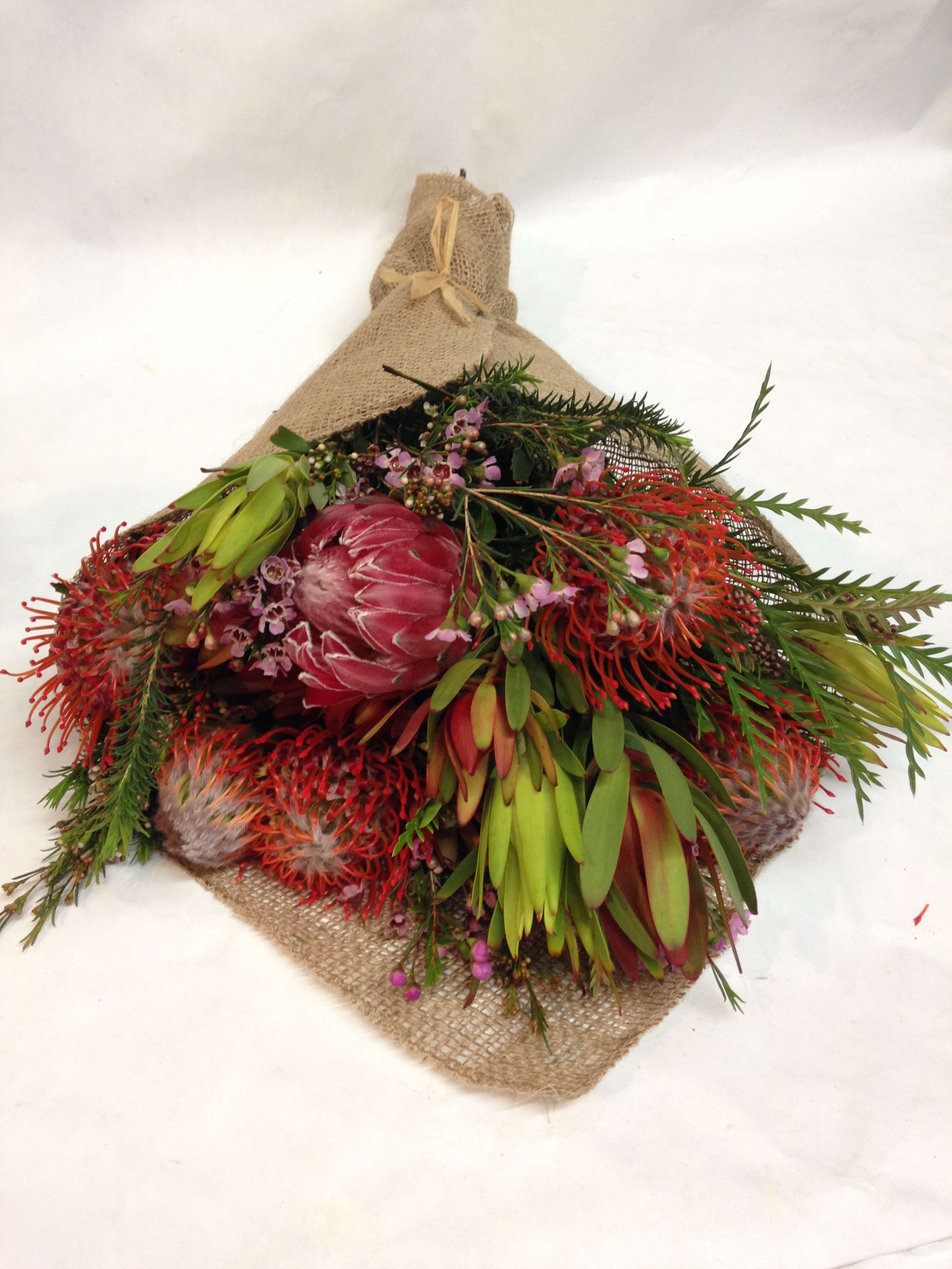 Protea-Pincushion Bouquet. (LONG LASTING) - A unique pincushion and protea bouquet that lasts up to 2 weeks and can be dried if desired.  (Some flowers may be subject to change depending on the season.  We will contact you with available flower substitutions; please contact us with specific questions if you are concerned with flower availability, thanks!)  Arrangement featured: $68.75 (Regular Price)