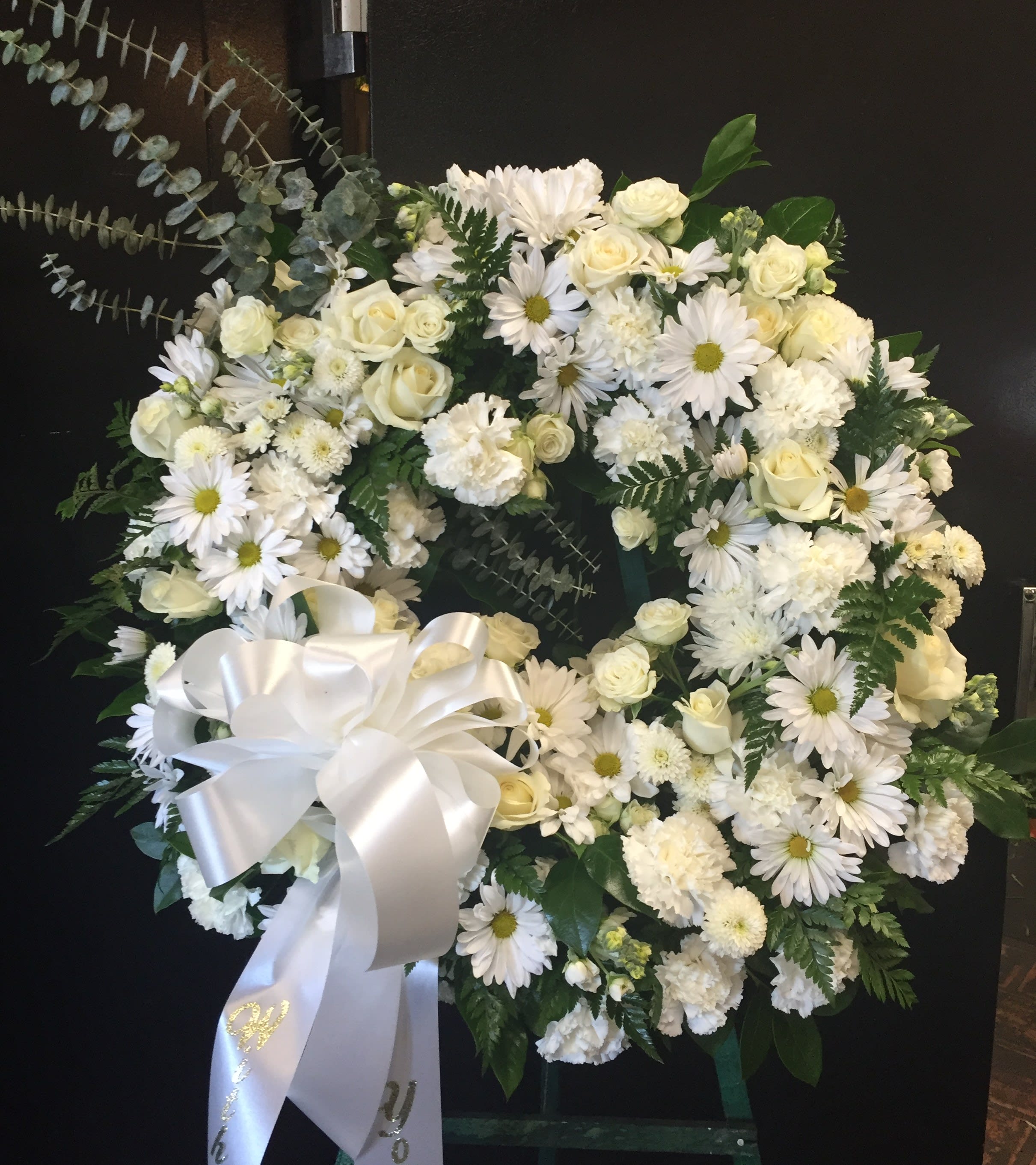 Thoughtful Memories - All white standing wreath Delivered on a 5 foot easel Roses, Mums, Carnations, and Daisies