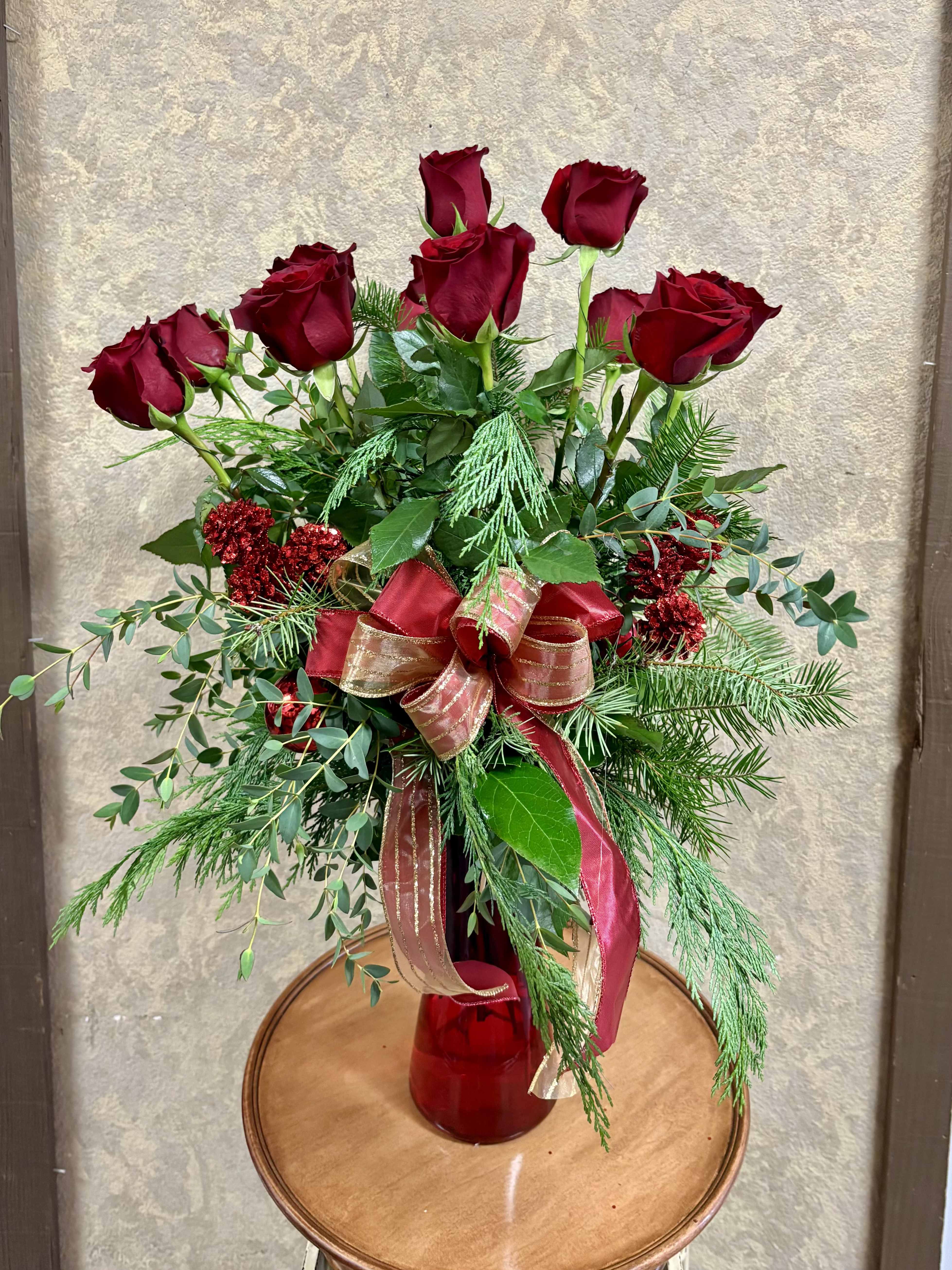 Holiday Long Stem Premium Roses - These festive roses include christmas gteens and ribbon that are perfect for the holiday season.