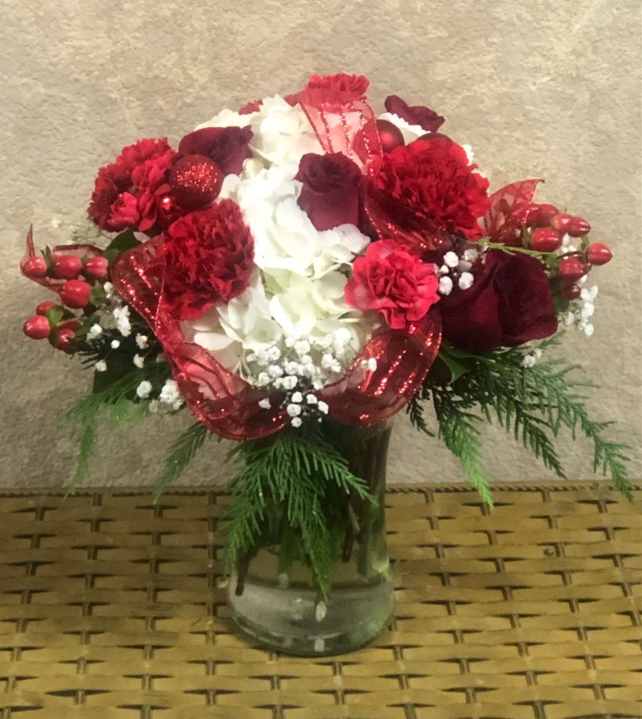 Merry Christmas To All - Type Of Flowers: Hydrangeas, Red Roses, Mini Carnations, and Christmas Ribbons with Ornaments.