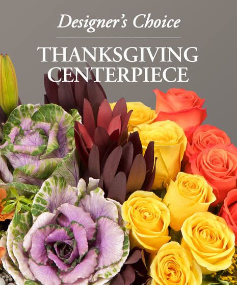 Designer's Choice Thanksgiving Long and Low Centerpiece - Our talented designers will create a lovely long and low centerpiece using our fresh assortment of select flowers. 
