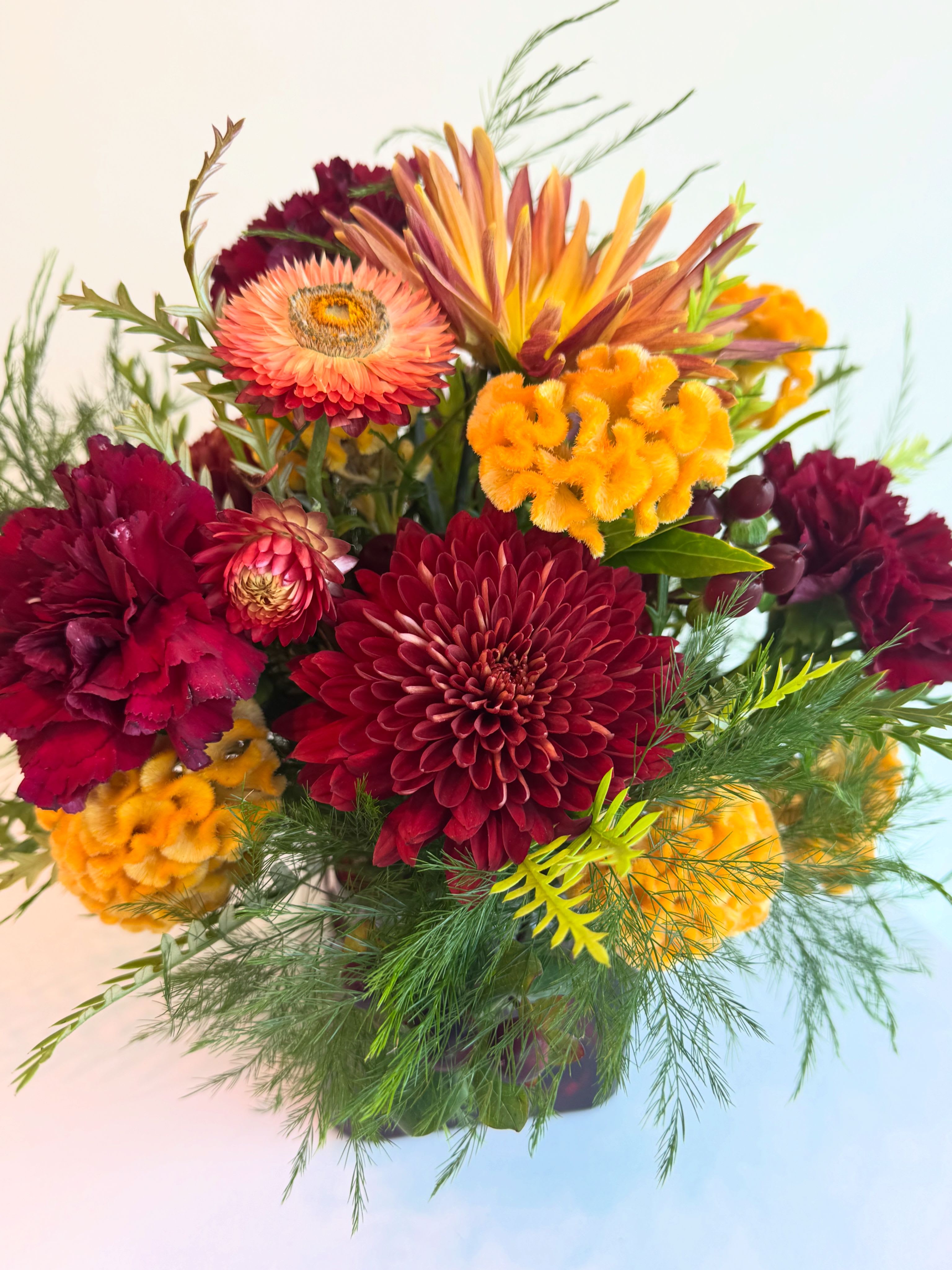 HARVEST BLOOMS - A beautiful array of flowers combined to match the perfect vibe of fall.