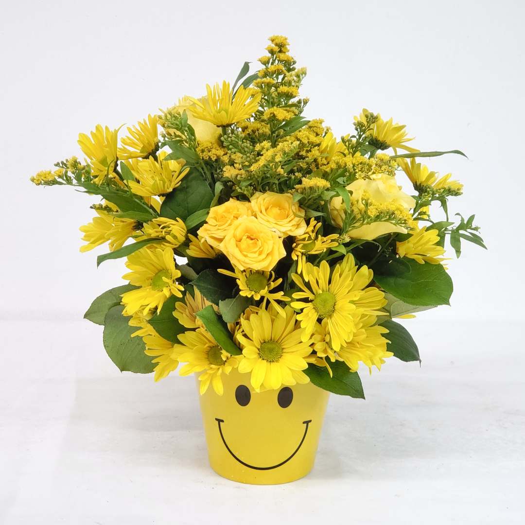Happy Sunny Days - A fun, happy pick-me-up arrangement for anyone needing some sunshine in their life. Comes in all yellow as pictured. If you'd like us to substitute with a mix of colors just let us know in the Florist Instructions box during checkout. Approximately 18" tall by 16" wide. 