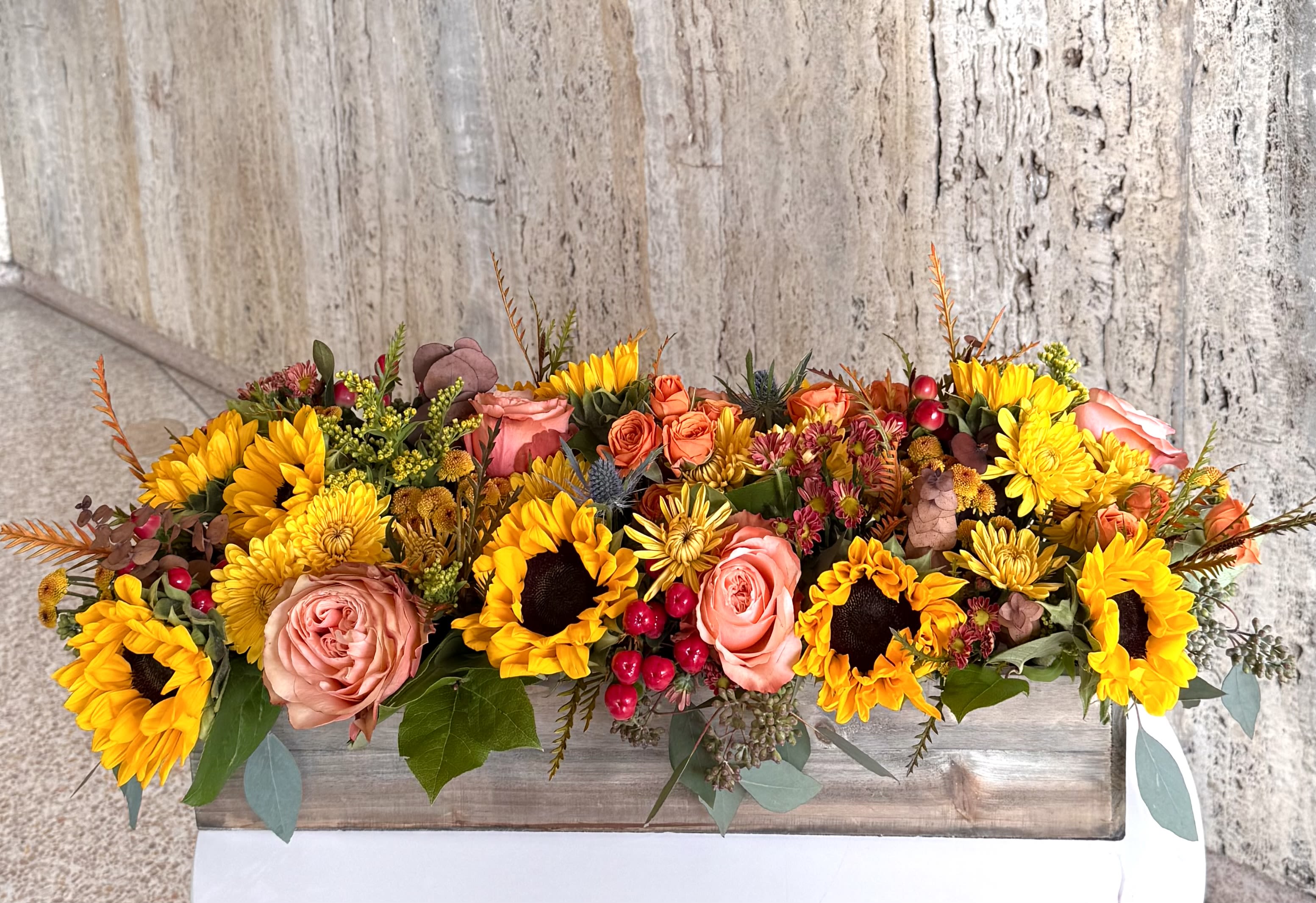 Fall centerpiece  - Autumn Harvest Floral Centerpiece – Sunflowers, Roses &amp; Seasonal Blooms Brighten your table with this stunning handcrafted fall centerpiece from Shoots and Blooms of DC. Designed in a rustic wooden box, this arrangement features vibrant sunflowers, peach garden roses, golden mums, red berries, and seasonal greenery. Perfect for Thanksgiving dinners, fall weddings, and home décor, this design brings warmth and elegance to any setting. Our fresh flower delivery in Washington, DC ensures long-lasting beauty and freshness.