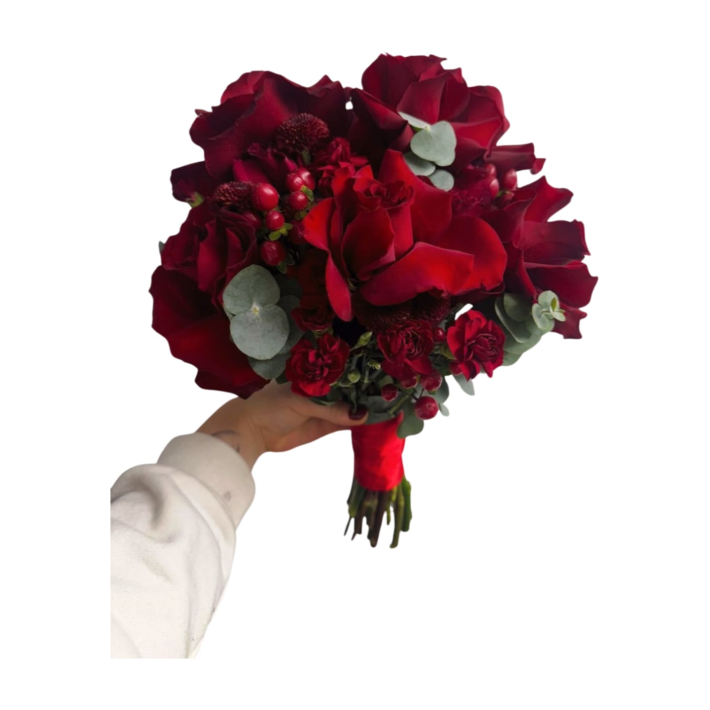 Velvet Vow - A rich, romantic bouquet made for the bold bride. Deep red roses, carnations, and hypericum berries wrapped in lush eucalyptus -it’s passion and elegance tied together in crimson satin. Perfect for winter weddings or anyone who loves a dramatic, timeless look.