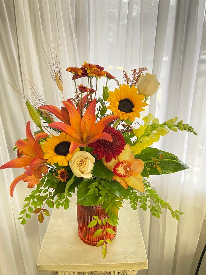Harvest on the Oregon Coast - A vase with lilies, roses, sunflowers, cymbidium orchids and more!