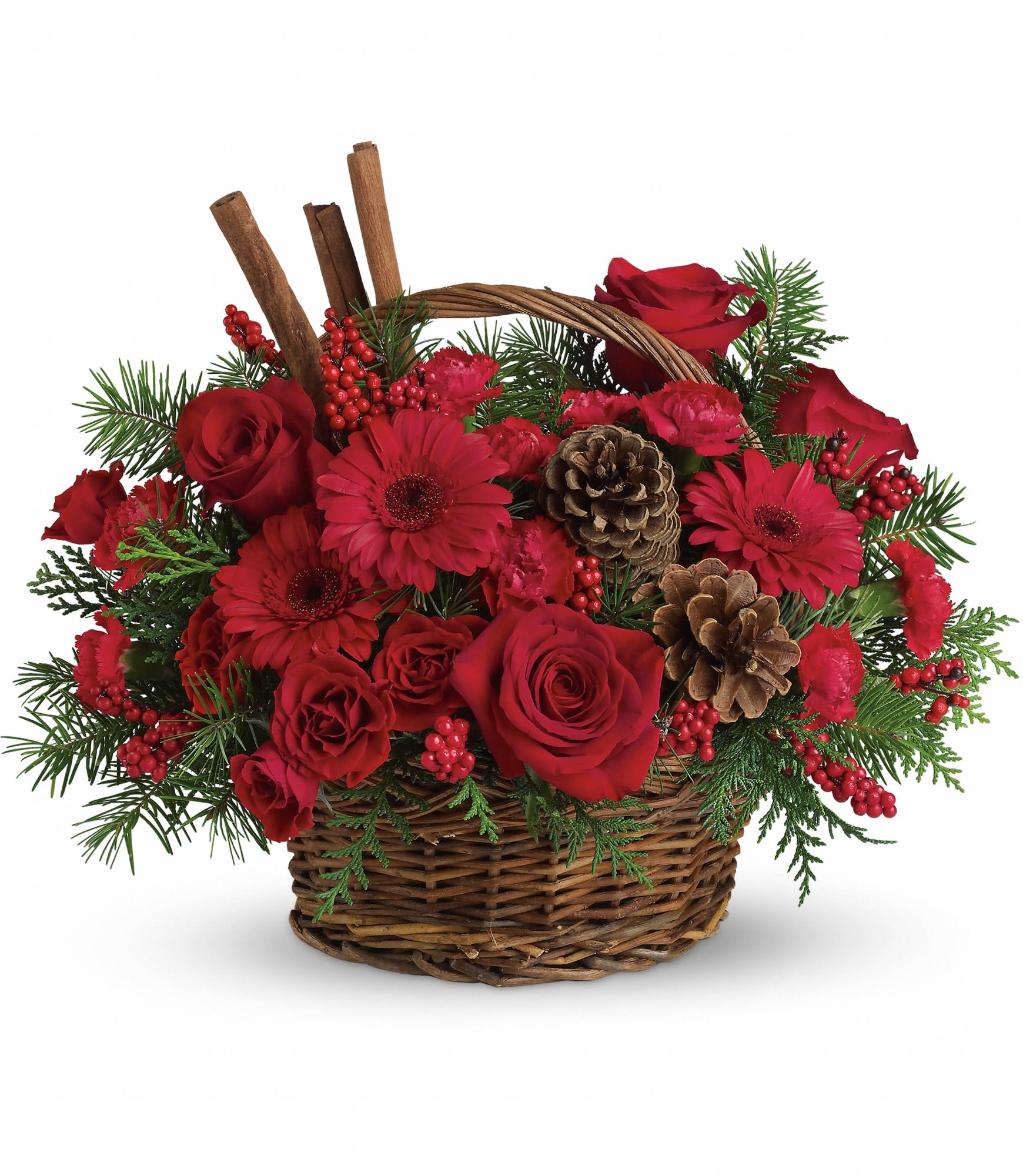 Berries and Spice Basket  - Berries and spice and everything nice make this beautiful flower arrangement a wonderful holiday gift. Festive red roses, gerberas, carnations and berries are arranged to look their holiday best when mixed with cinnamon sticks and pinecones in a lovely wicker basket. It's a great way to get a handle on your holiday gift list! Approximately 16&quot; W x 13&quot; H