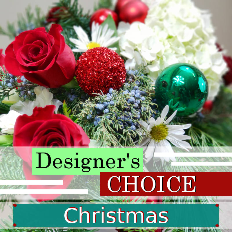 Designer's Choice Christmas Arrangement - Starting at just $49.95, a designer's choice arrangement is the best value for your holiday flower gift giving. Using the freshest flowers and greens we will a unique arrangement just for you. If you have any special requests let us know in the &quot;Florist Instructions&quot; section during checkout. Otherwise, rest assured we'll design a special, festive arrangement full of merriment!