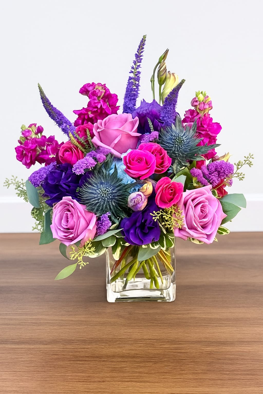 Very Berry - Very Berry – Lush Purple and Pink Floral Arrangement  Bold, modern, and full of charm — Very Berry is a striking blend of deep purples, magentas, and soft pinks. Featuring premium roses, lisianthus, stock, and thistle, this lush arrangement brings a rich pop of color and texture to any space. Perfect for birthdays, celebrations, or sending a stylish “just because” surprise.  Handcrafted by Polk Street Florist, Very Berry showcases boutique artistry and long-lasting blooms, making it a favorite for modern flower lovers in San Francisco.