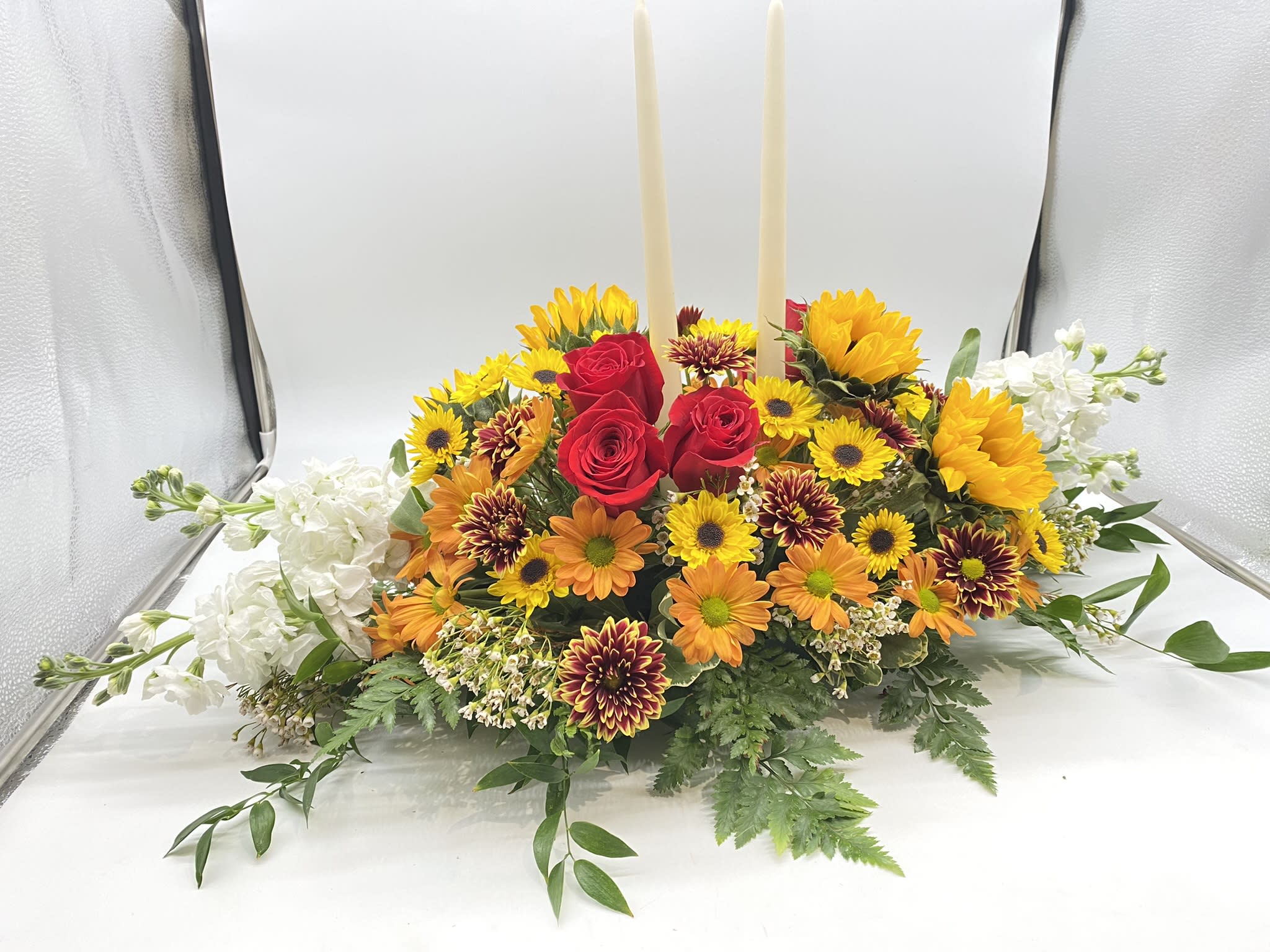 The Rays of Sun Centepiece - A seasonal centerpiece with yellow hues to wow the recipient...